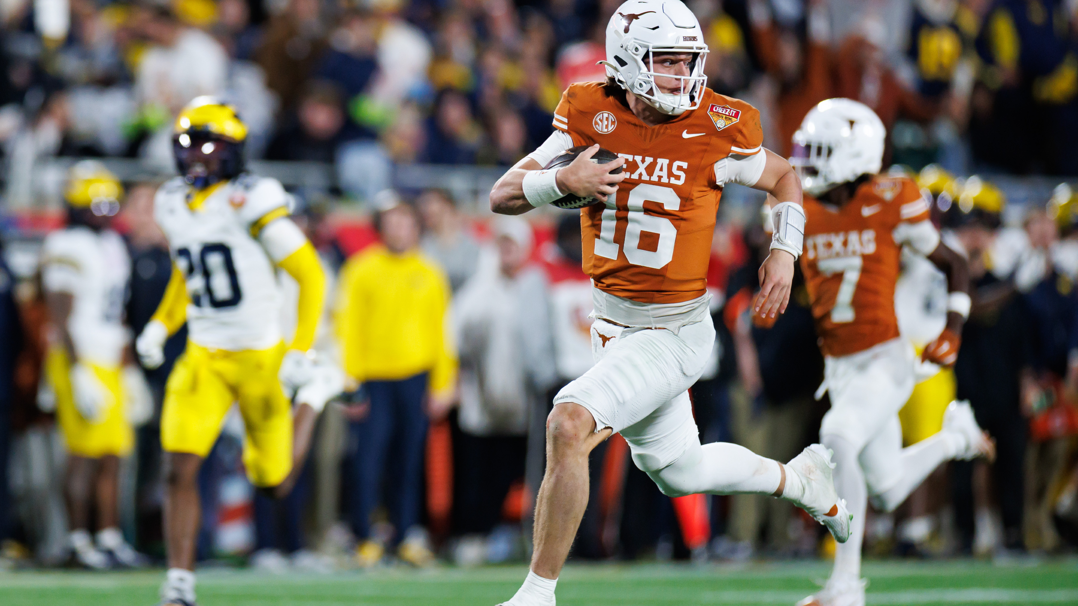 Texas Longhorns quarterback Arch Manning rushes as we make our best Texas State vs. Texas early predictions