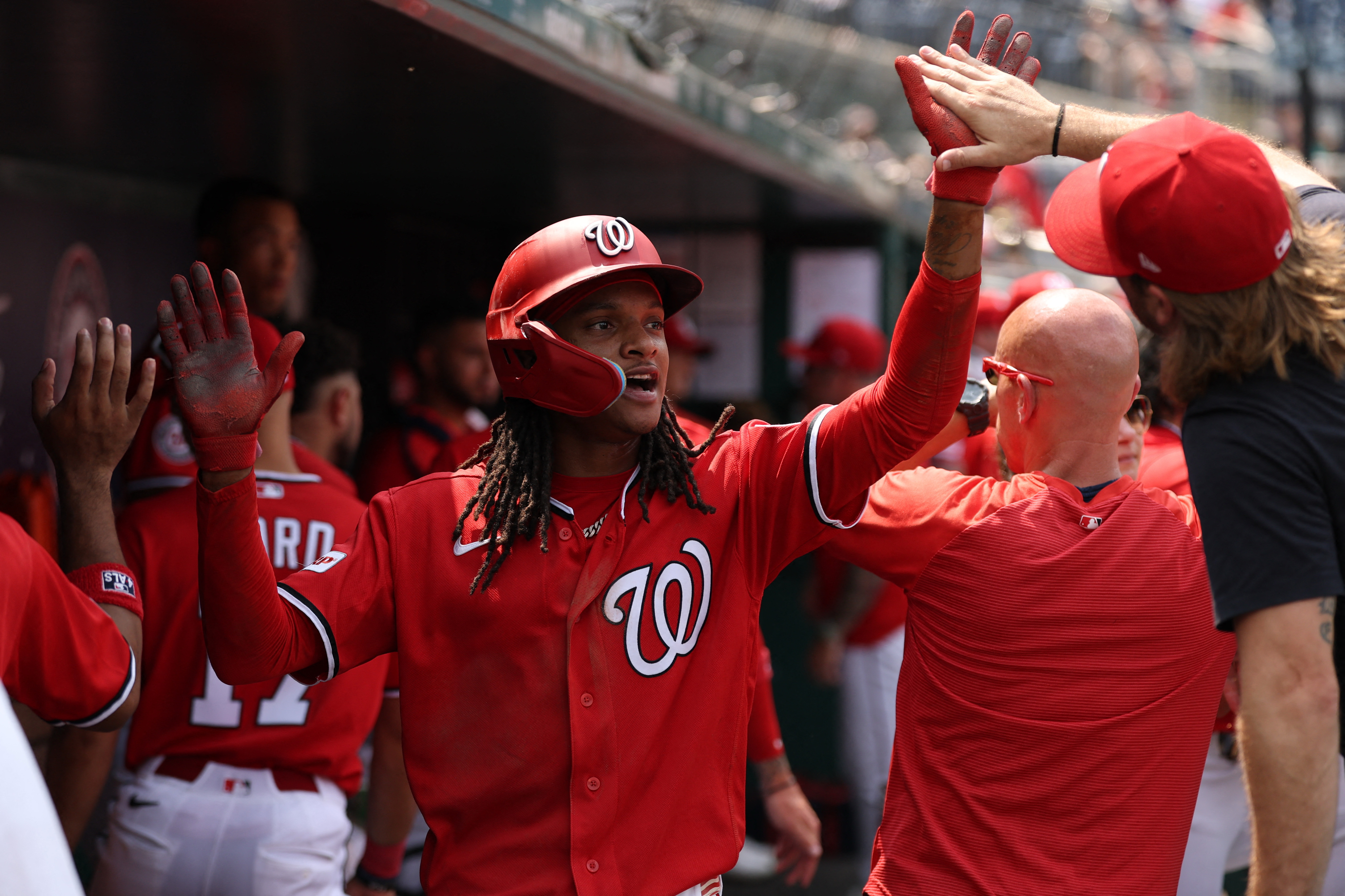 Washington Nationals shortstop CJ Abrams (5) celebrates as we break down our Nationals vs. Mets prediction.