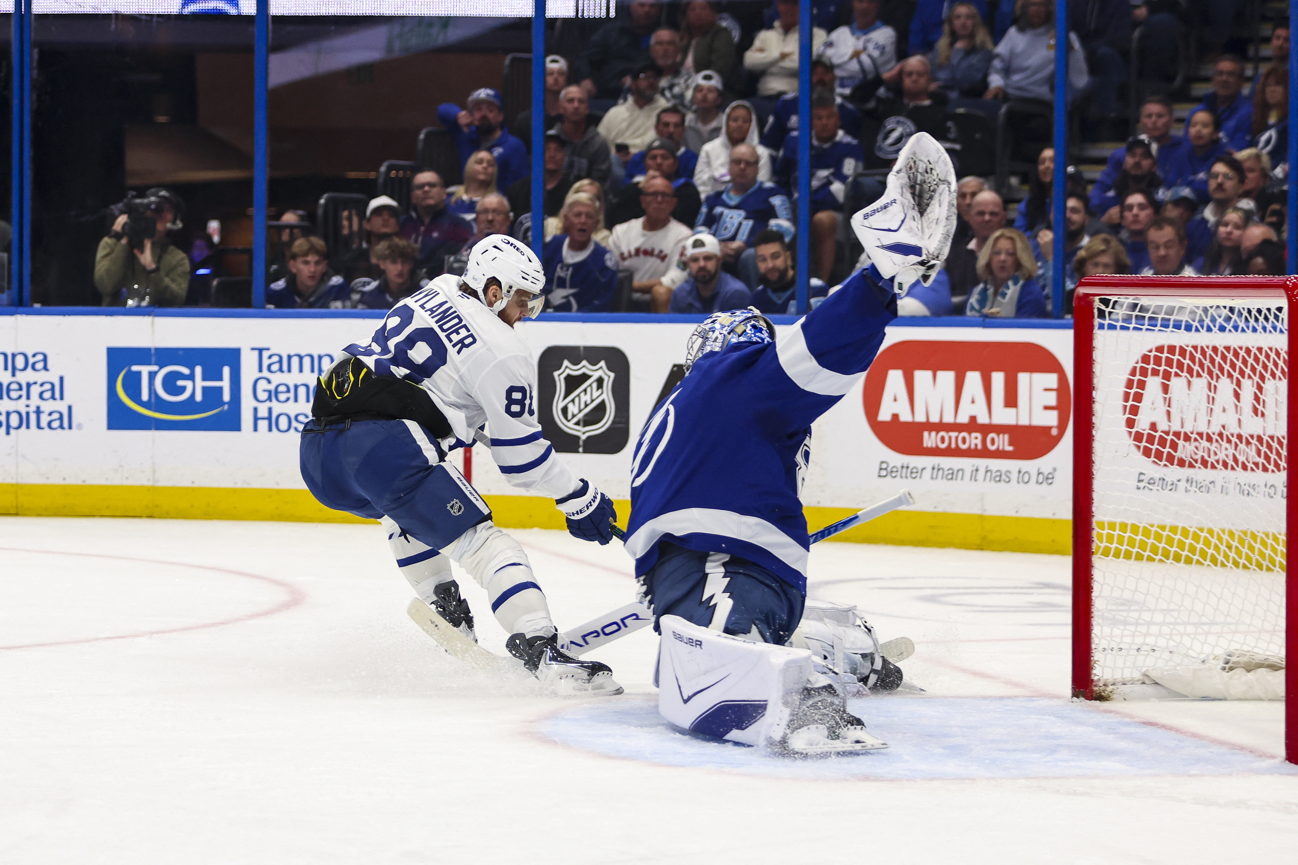 Andrei Vasilevskiy makes a save on William Nylander as we provide our NHL award predictions. 