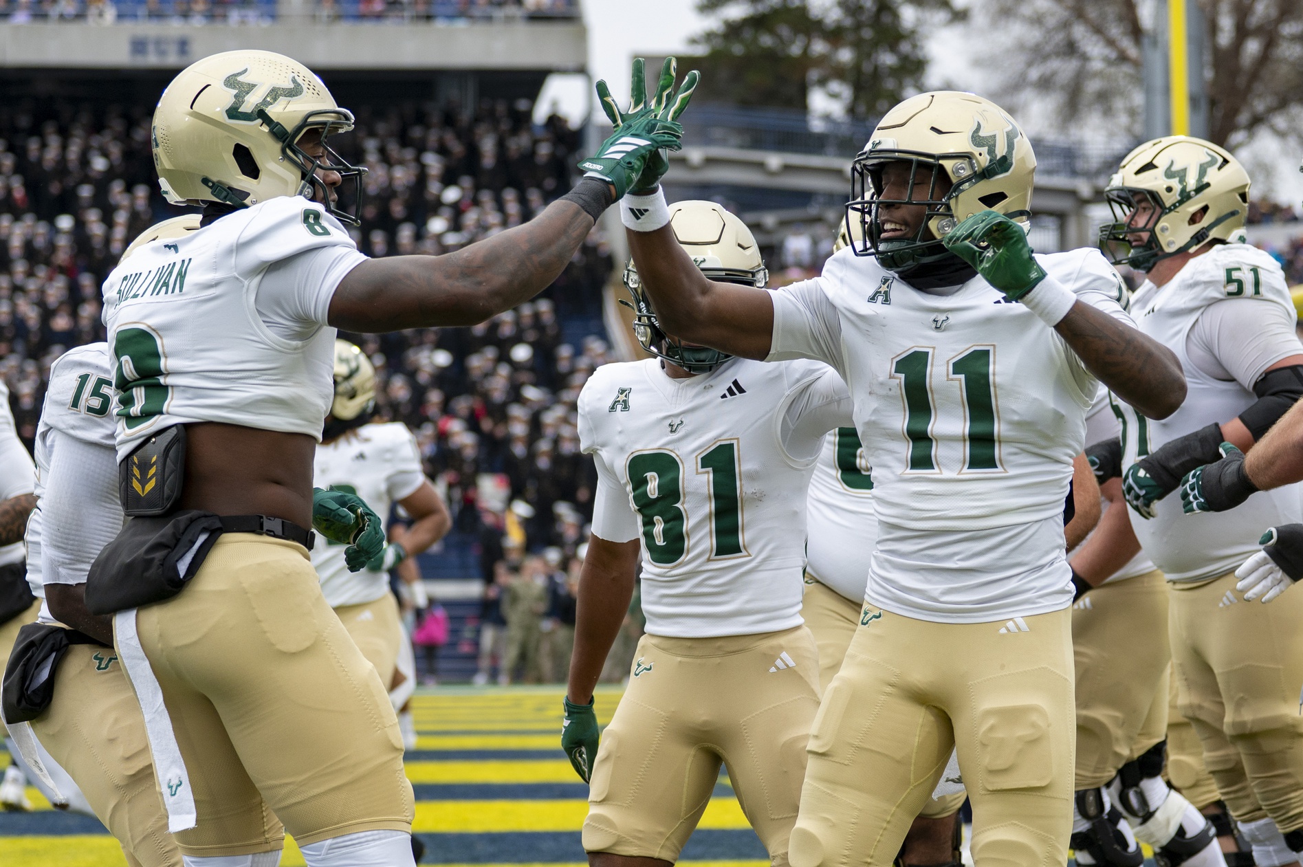 Keshaun Singleton celebrates with tight end Wyatt Sullivan after scoring a touchdown as we offer our Old Dominion vs. South Florida predictions.