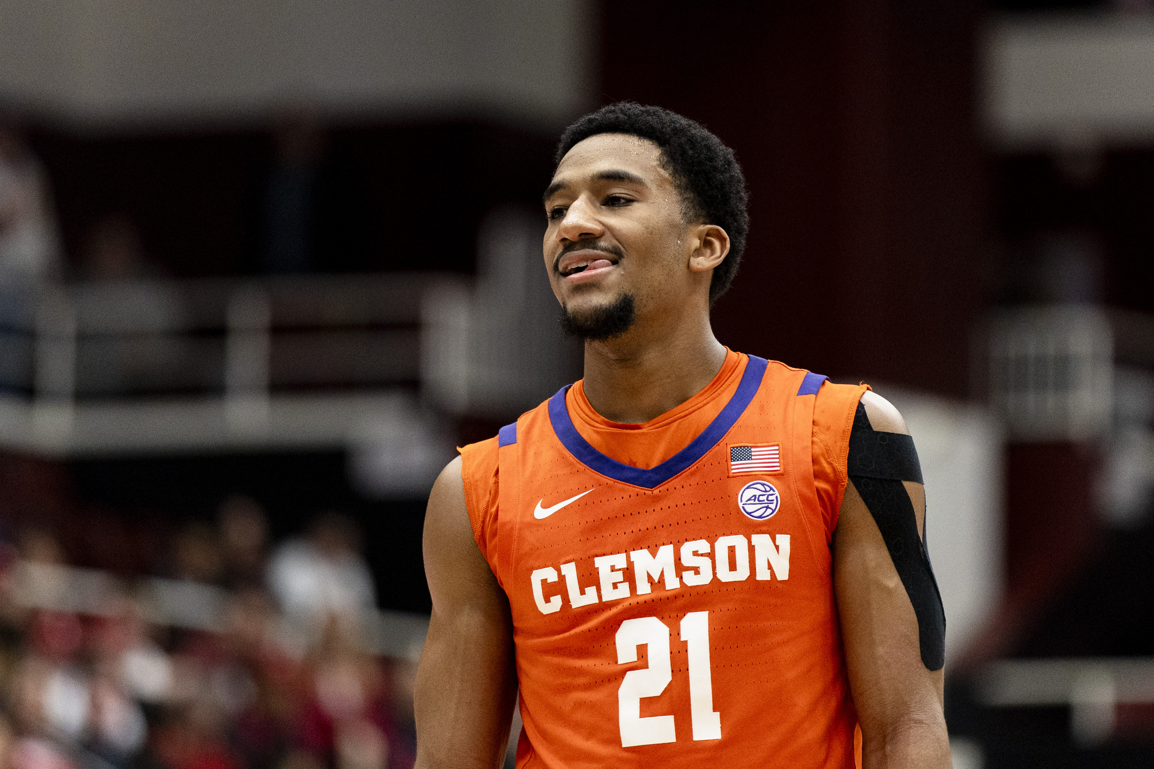 Clemson Tigers guard Ace Buckner (21), seen here smiling after a free throw, is featured in our Iowa vs. Clemson prediction today.