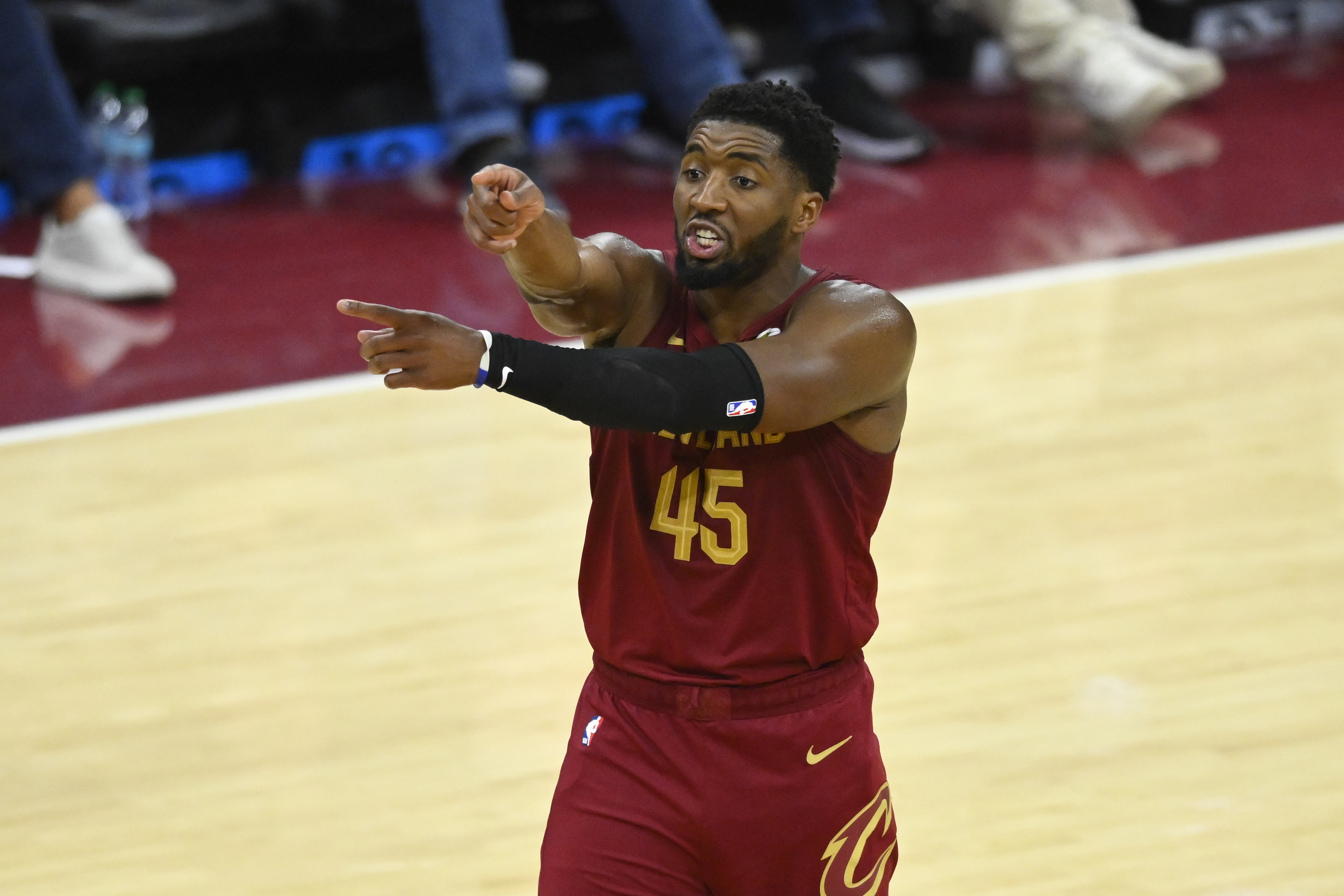 Cleveland Cavaliers guard Donovan Mitchell (45) reacts as we break down our NBA best bets today.