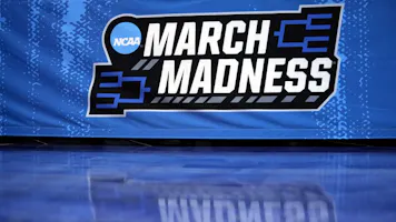 A detailed view of the March Madness logo is seen prior to the first round game between the Utah State Aggies and the Missouri Tigers in the NCAA Men's Basketball Tournament at Golden 1 Center on March 16, 2023 in Sacramento, California.