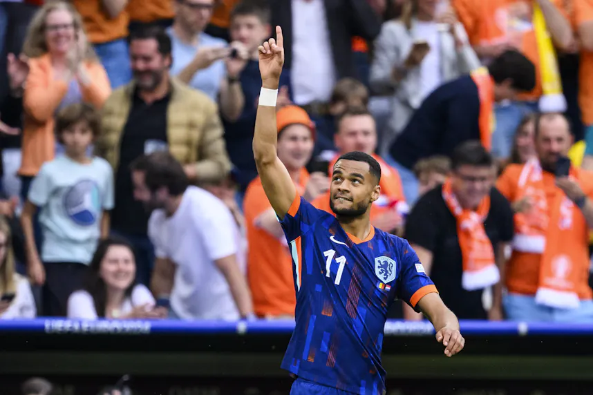 Cody Gakpo celebrates his goal against Romania as we offer our predictions and best bets for the Netherlands vs. Turkey Euro 2024 quarterfinal.