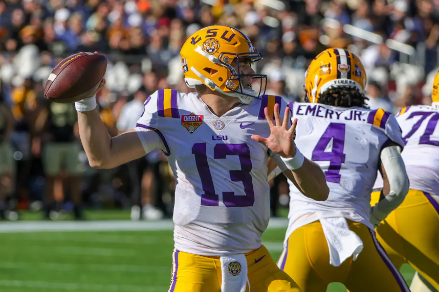 LSU Tigers quarterback Garrett Nussmeier (13) passes the ball as we offer our best LSU vs. USC prediction and expert picks for Sunday's Week 1 matchup.