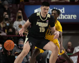 Zach Edey of the Purdue Boilermakers has the ball knocked away as we look at the best Wooden Award odds