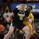 Zach Edey of the Purdue Boilermakers has the ball knocked away by Charlie Daniels of the Minnesota Golden Gophers as we look at our top odds and picks for college basketball's Wooden Award.