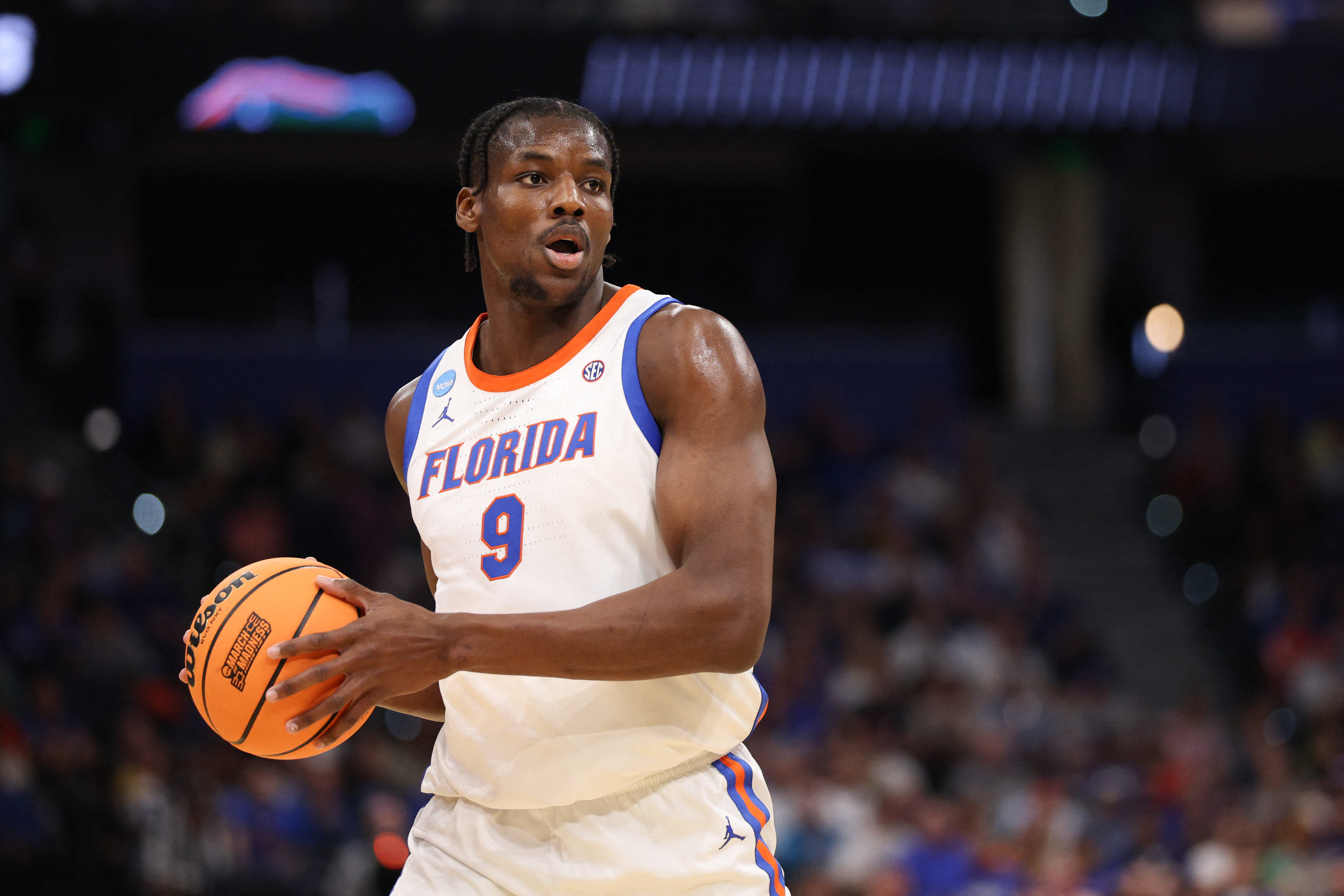 Florida Gators center Rueben Chinyelu (9) looks to pass as he is featured in our Iowa vs. Florida prediction & picks.