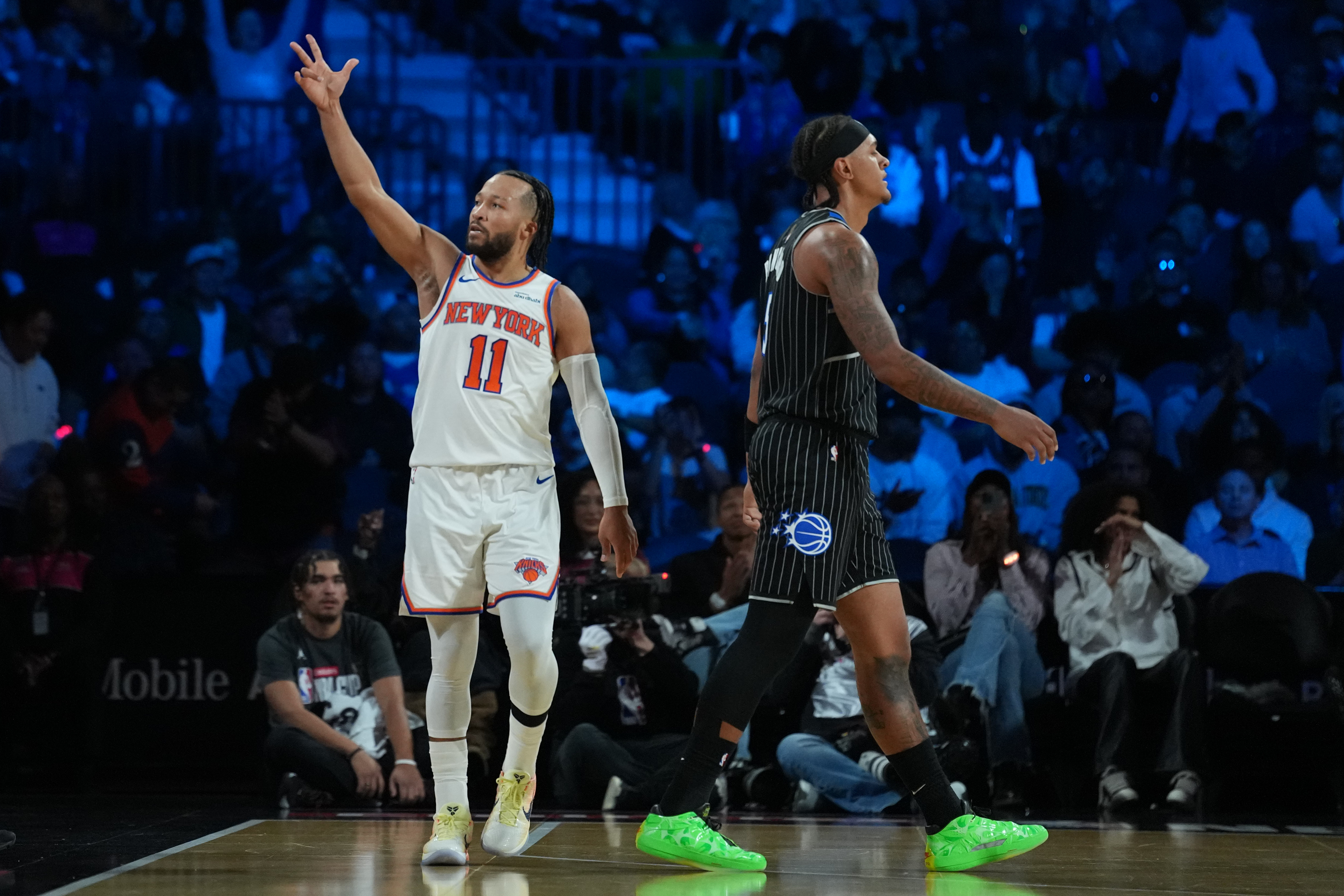 New York Knicks guard Jalen Brunson (11) reacts as he is featured in our Spurs vs. Knicks player props for NBA Cup Final.