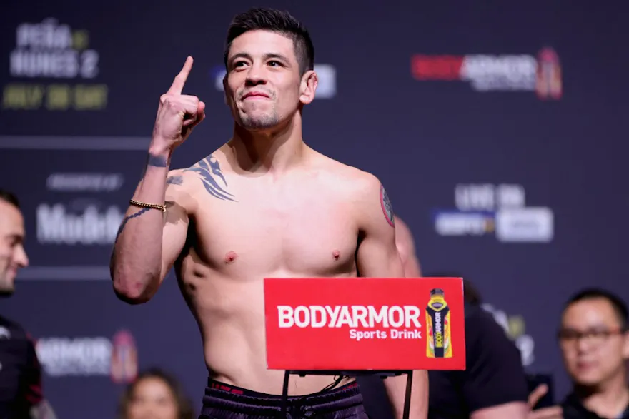Brandon Moreno of Mexico poses on the scale during the UFC 277 ceremonial weigh-in at American Airlines Center as we look at our Moreno-Pantoja pick.
