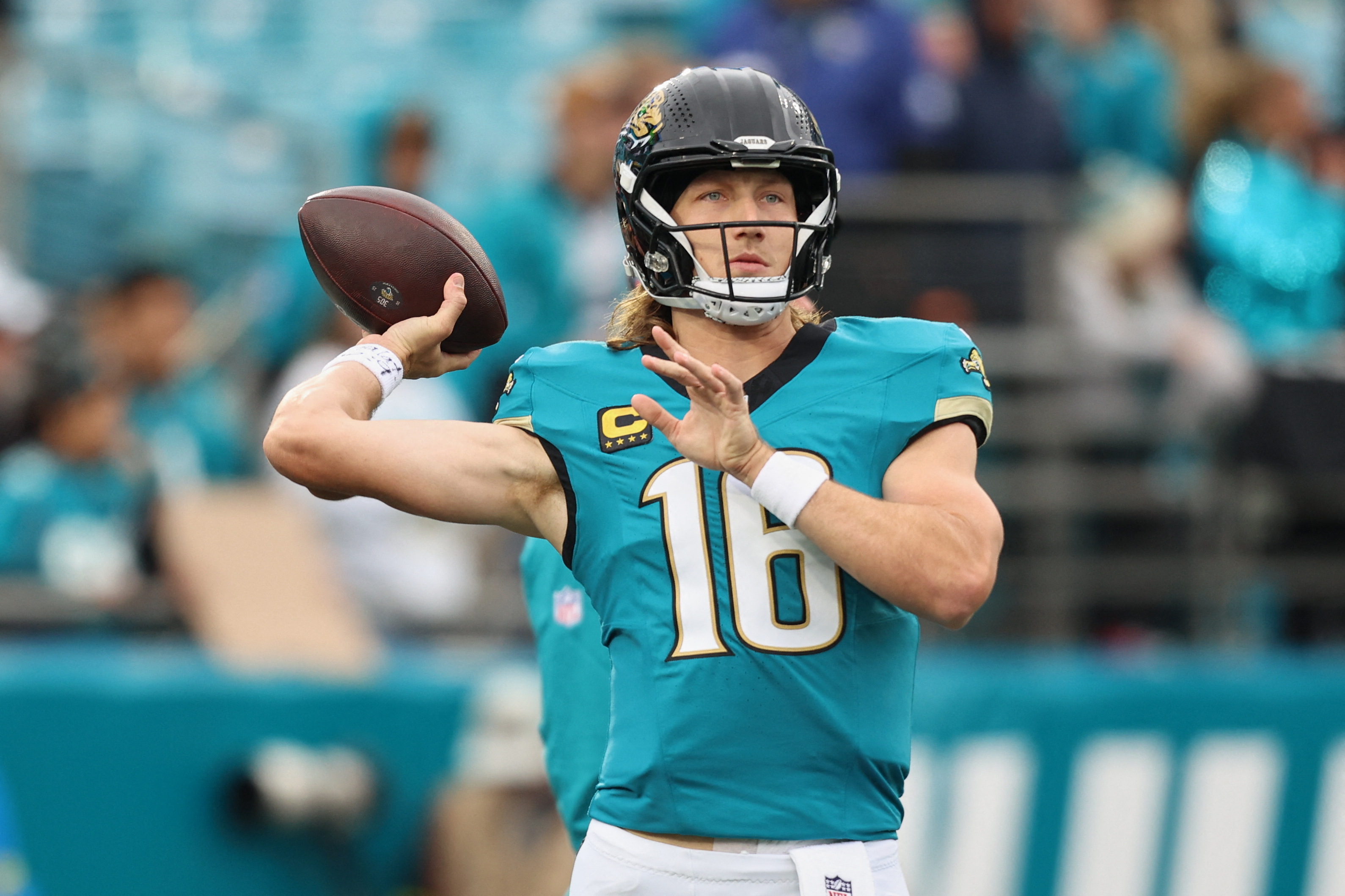 Trevor Lawrence throws a pass as we provide our Bills vs. Jaguars prediction and best bets.