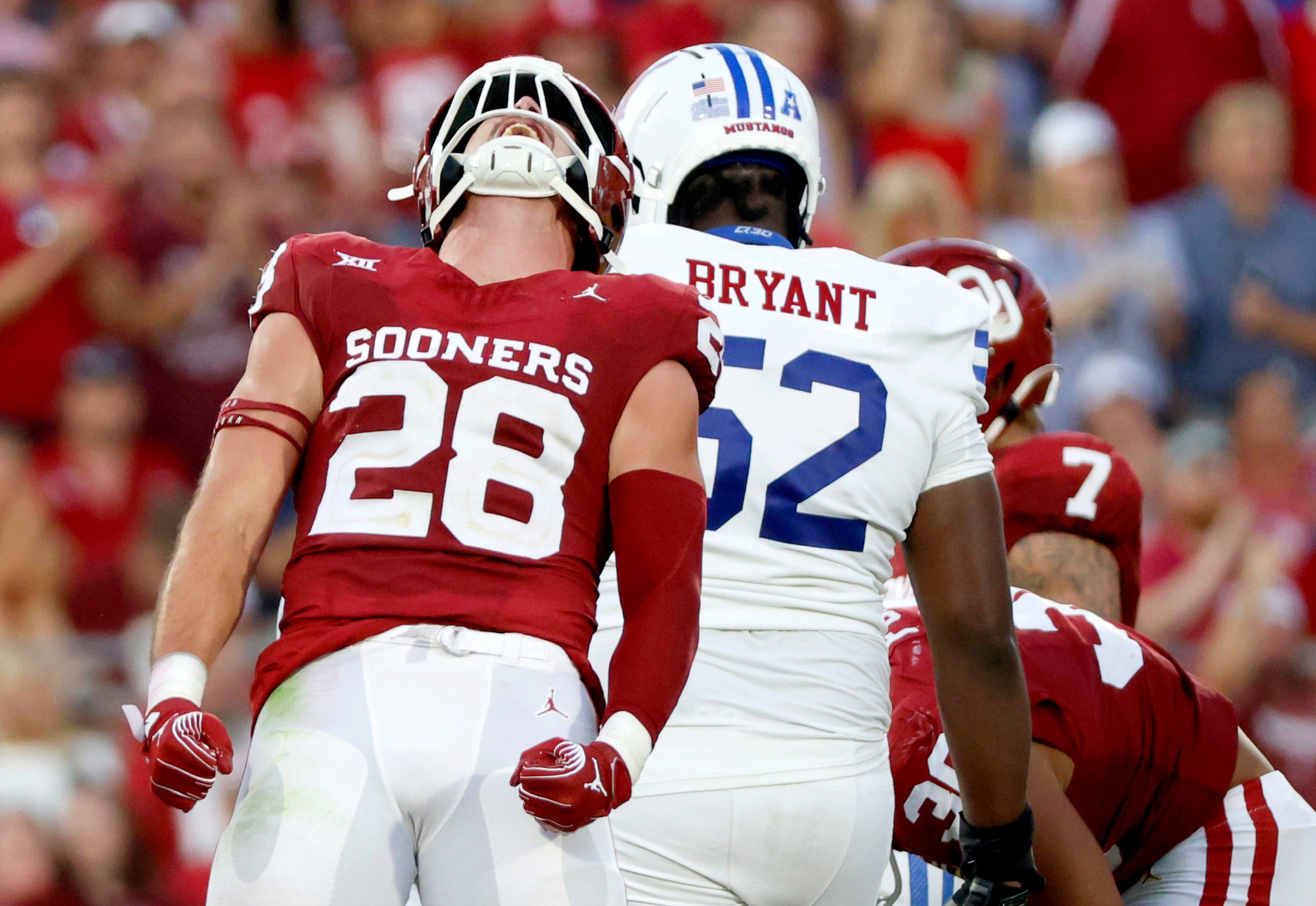 Oklahoma's Danny Stutsman celebrates a play against SMU. The Sooners are part of our college football bold predictions for the 2024-25 season.