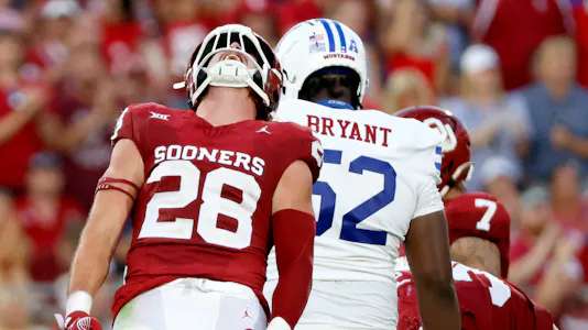 Oklahoma's Danny Stutsman celebrates a play against SMU. The Sooners are part of our college football bold predictions for the 2024-25 season.