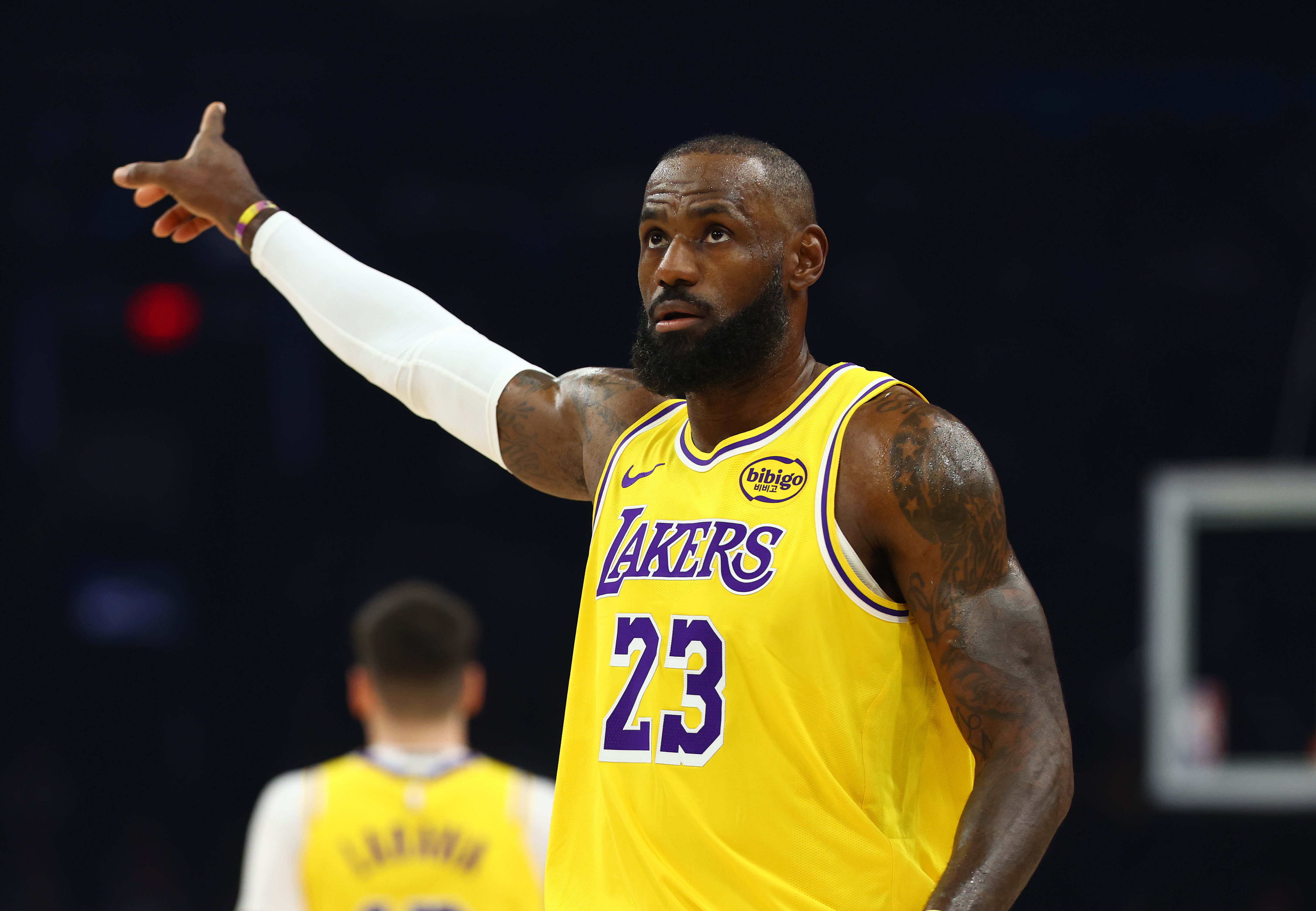 Los Angeles Lakers forward LeBron James (23) reacts as he is featured in our LeBron James player prop picks for NBA Christmas Day.