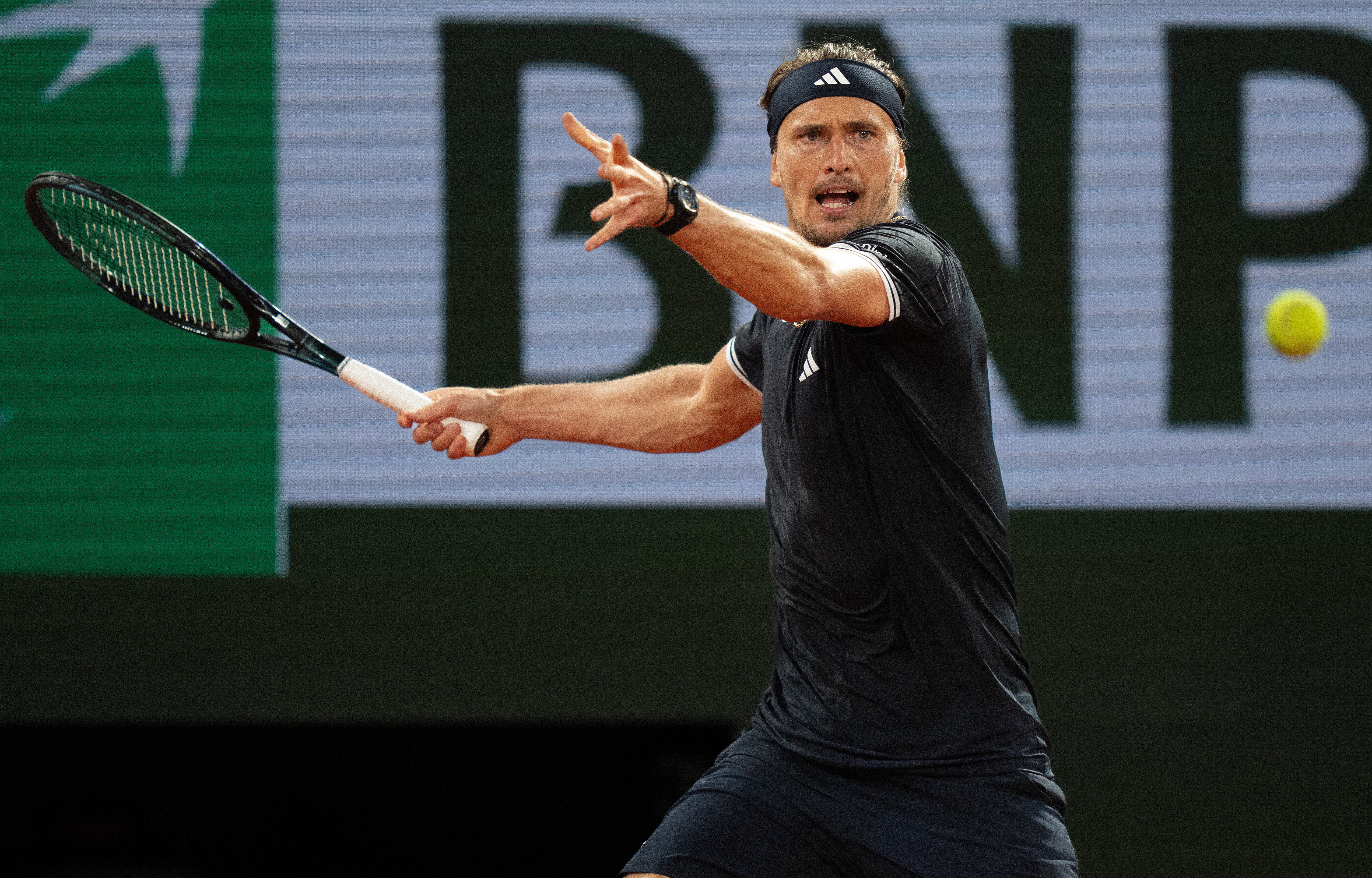 Alexander Zverev of Germany returns a shot as we make our best Mensik vs. Zverev predictions