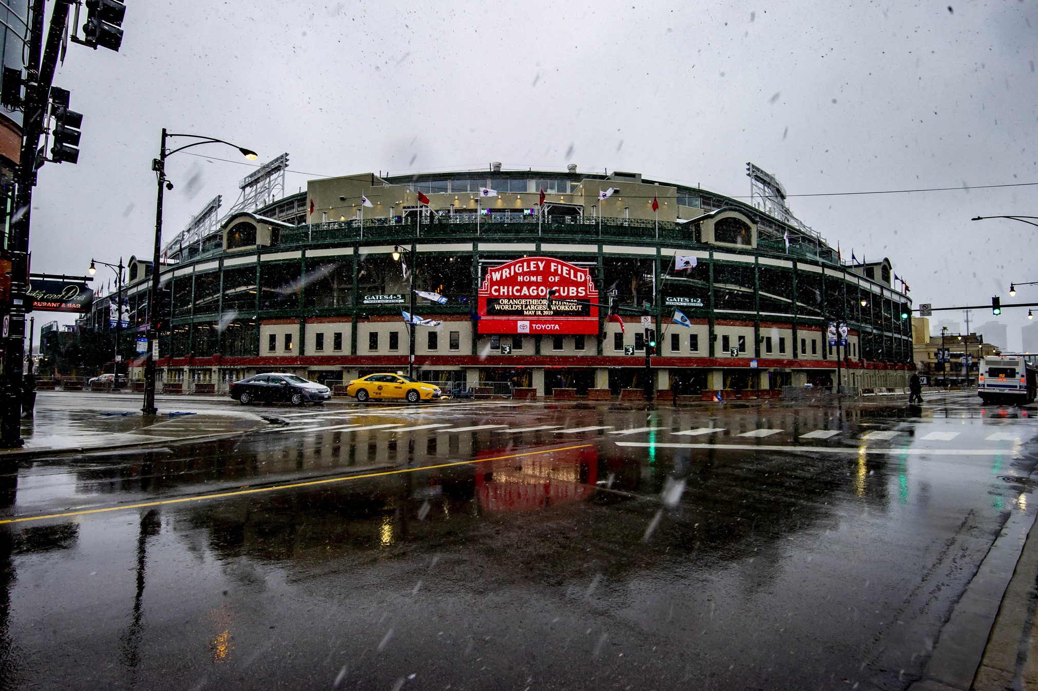 Scenes of a snow/rain cancelled game between at Wrigley Field as we look at the White Christmas in Chicago prediction market.