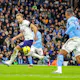 Harry Kane of Tottenham Hotspur runs with the ball during the Premier League match between Manchester City and Tottenham Hotspur on Jan. 19, 2023 at Etihad Stadium in Manchester, UK.
