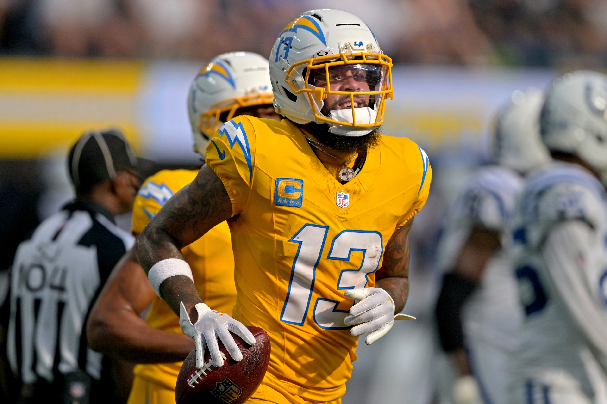 Los Angeles Chargers wide receiver Keenan Allen celebrates after a touchdown, and he's featured in our Texans vs. Chargers player props