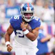 Saquon Barkley of the New York Giants carries the ball during warmups of a preseason game against the Cincinnati Bengals.