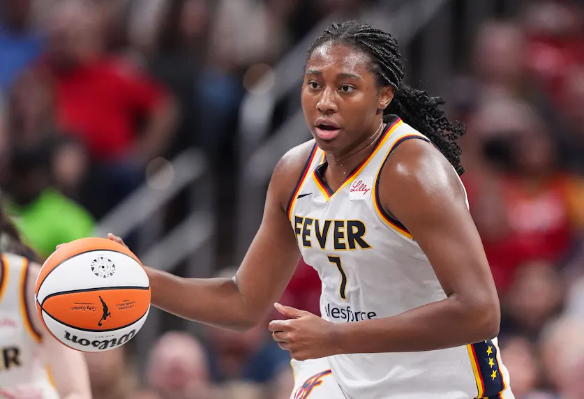 Indiana Fever forward Aliyah Boston (7) rushes up the court as we offer our Aces vs. Fever prediction and expert picks for Wednesday's WNBA matchup at Gainbridge Fieldhouse in Indianapolis.