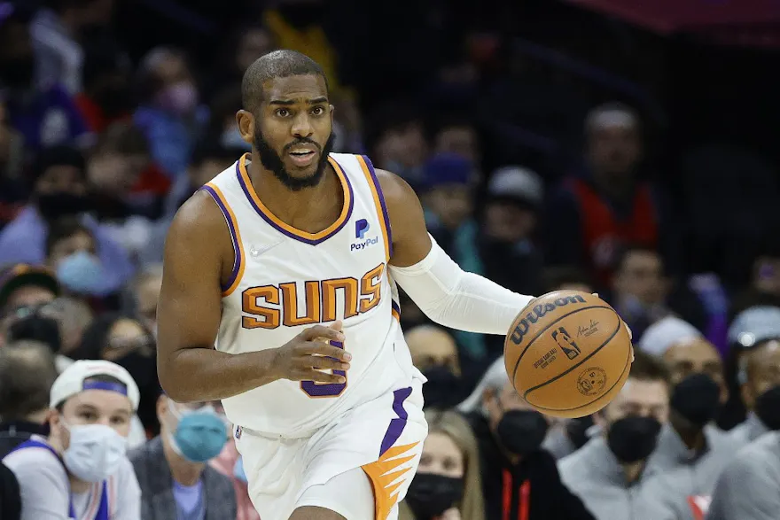 Chris Paul of the Phoenix Suns dribbles against the Philadelphia 76ers at Wells Fargo Center in Philadelphia, Pennsylvania. Photo by Tim Nwachukwu / Getty Images via AFP.