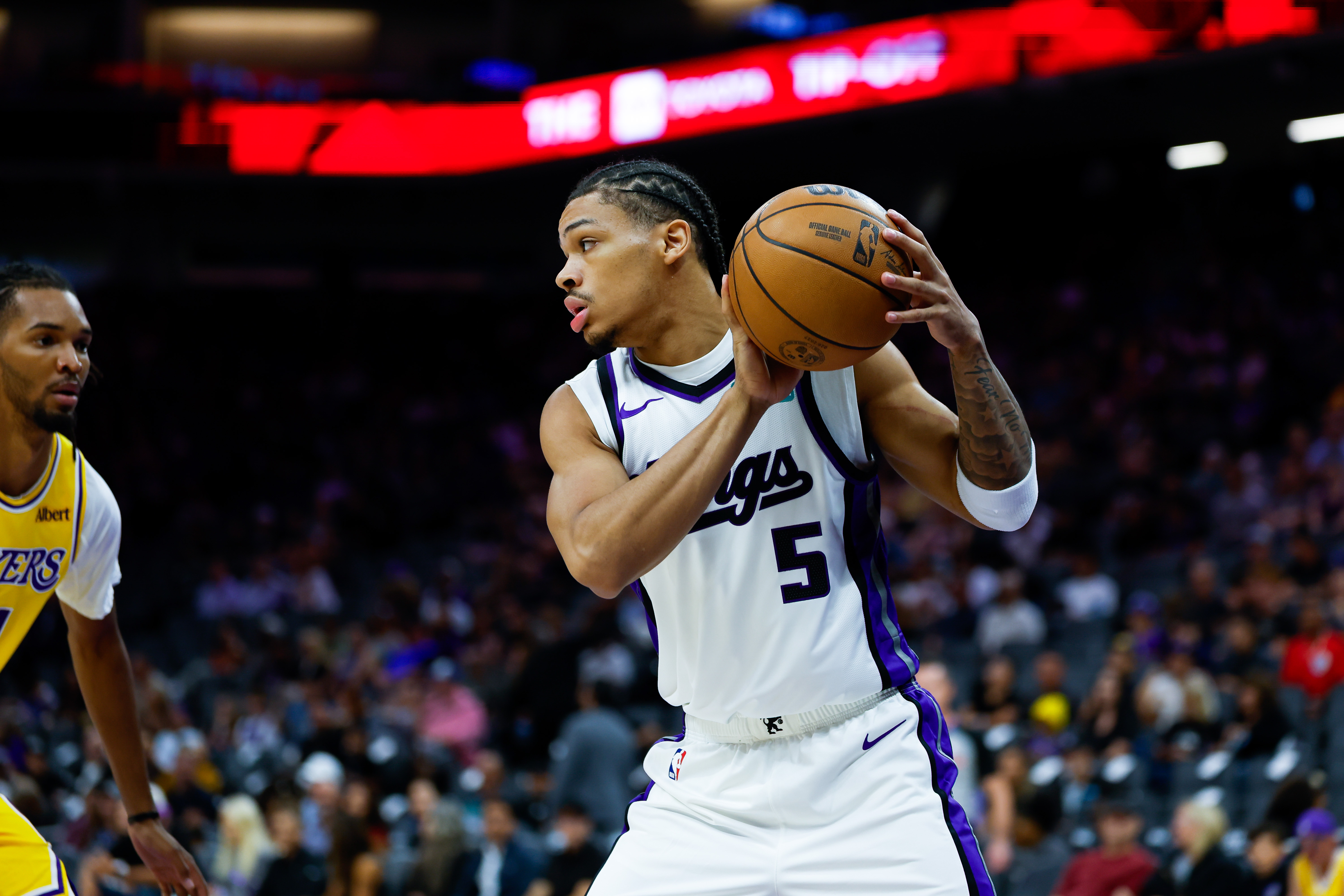Kings guard Darius Acuff Jr. (5) controls the ball as we analyze the 2026-27 NBA Rookie of the Year odds.