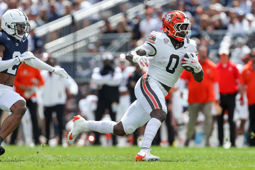 Bowling Green tight end Harold Fannin Jr. runs with the ball against Penn State. We're backing the Falcons in our Arkansas State vs. Bowling Green prediction.