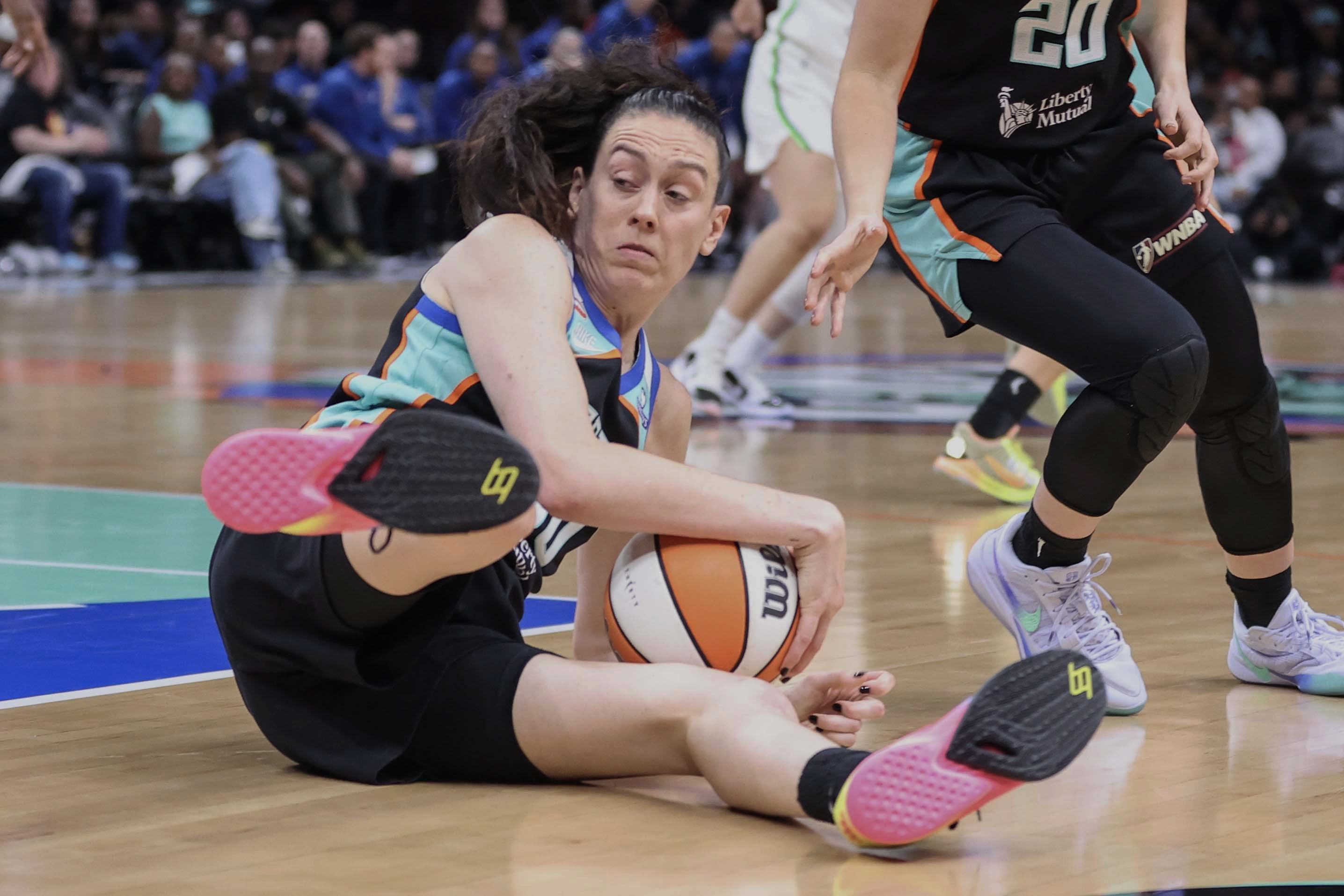 New York Liberty forward Breanna Stewart (30) grabs a loose ball as she is featured in ouyr Liberty vs. Dream prediction.