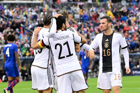 Germany midfielder Ilkay Gundogan celebrates with teammates after a goal against the United States as Gary Pearson offers his best props picks and Germany vs. Scotland predictions for the Euro 2024 opener.