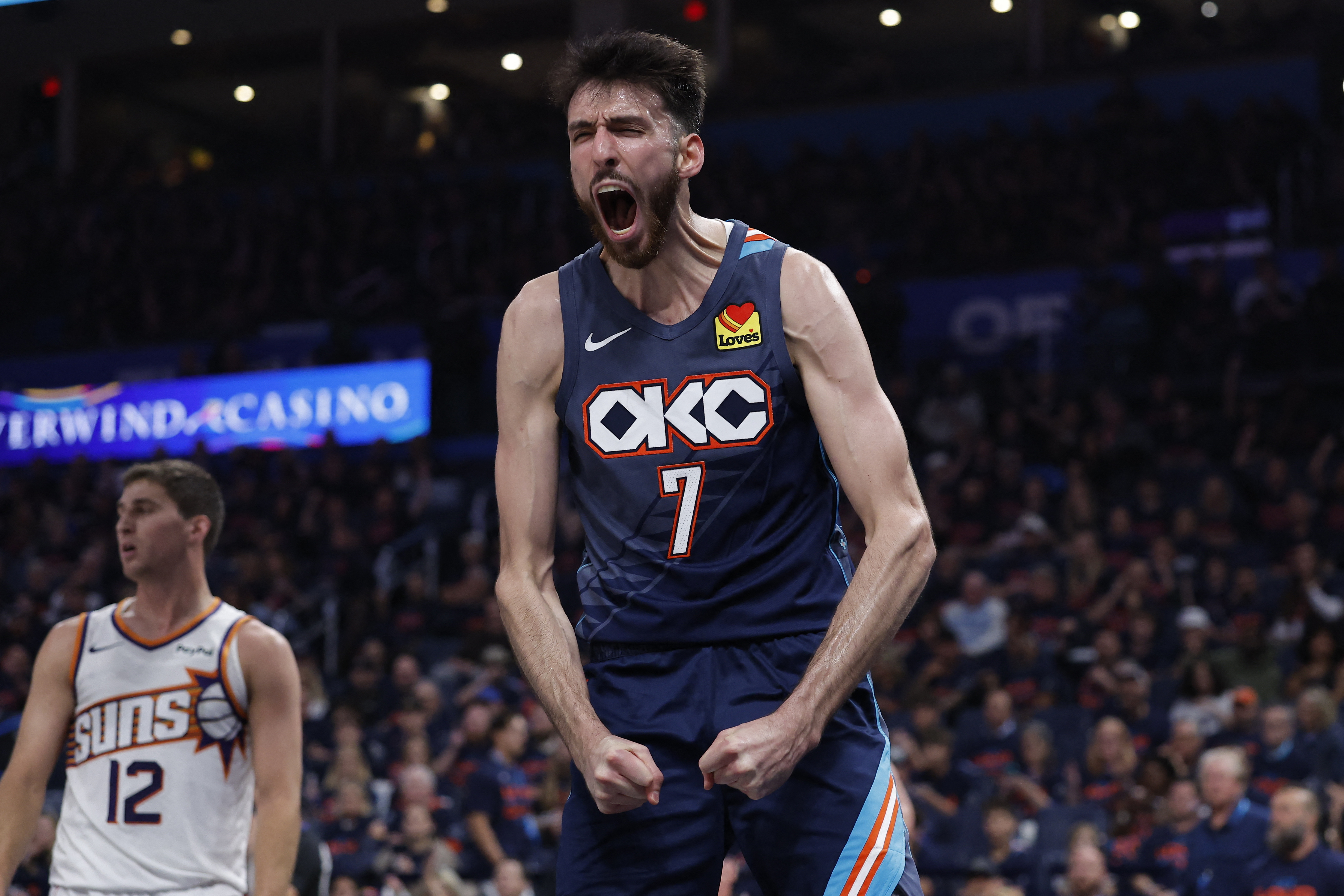 Oklahoma City Thunder center Chet Holmgren (7) screams after scoring as he is featured in our Thunder vs. Suns player props.