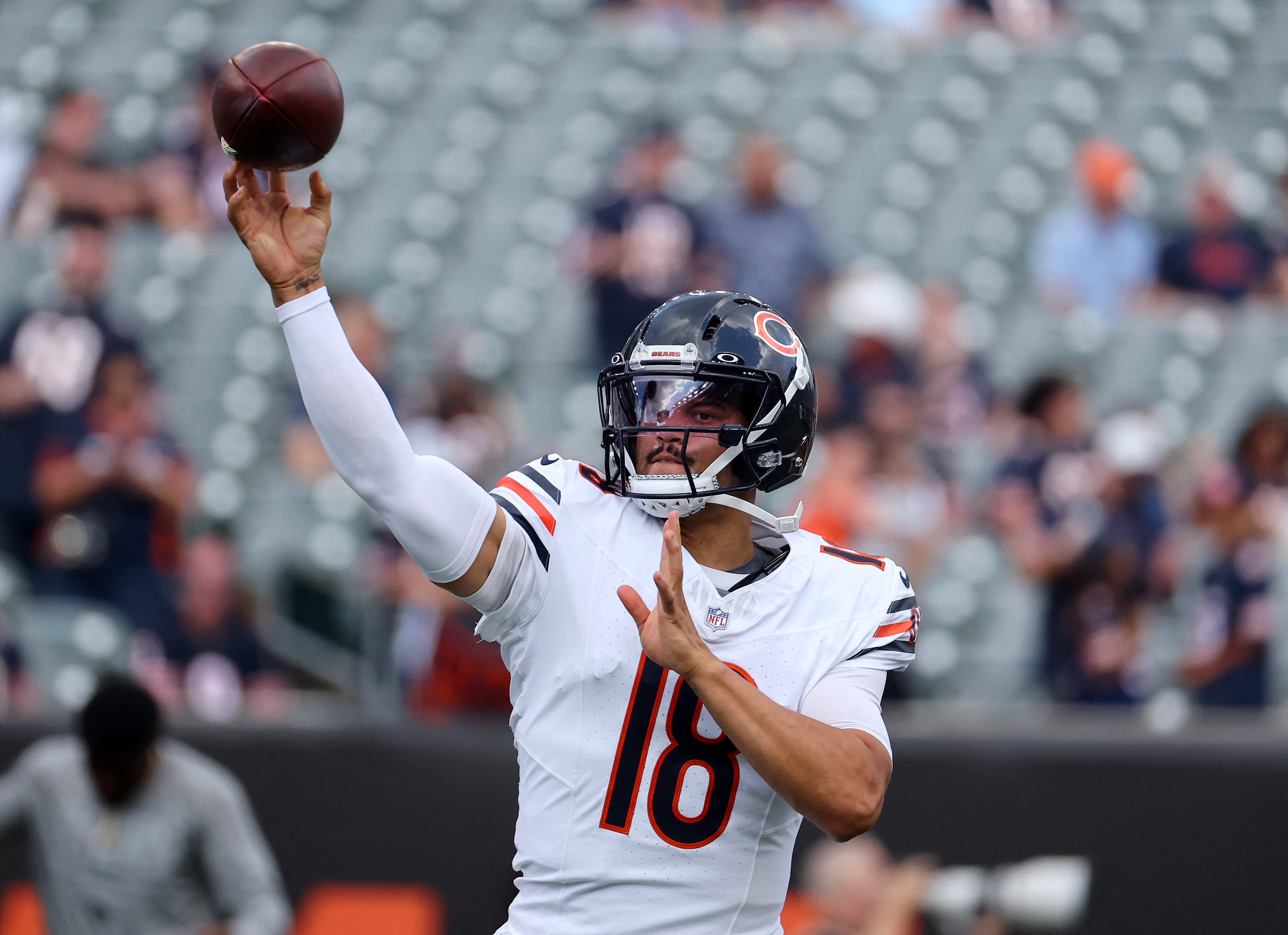 Chicago Bears quarterback Caleb Williams (18) warms up as he is featured in our Bears vs. Panthers prediction.