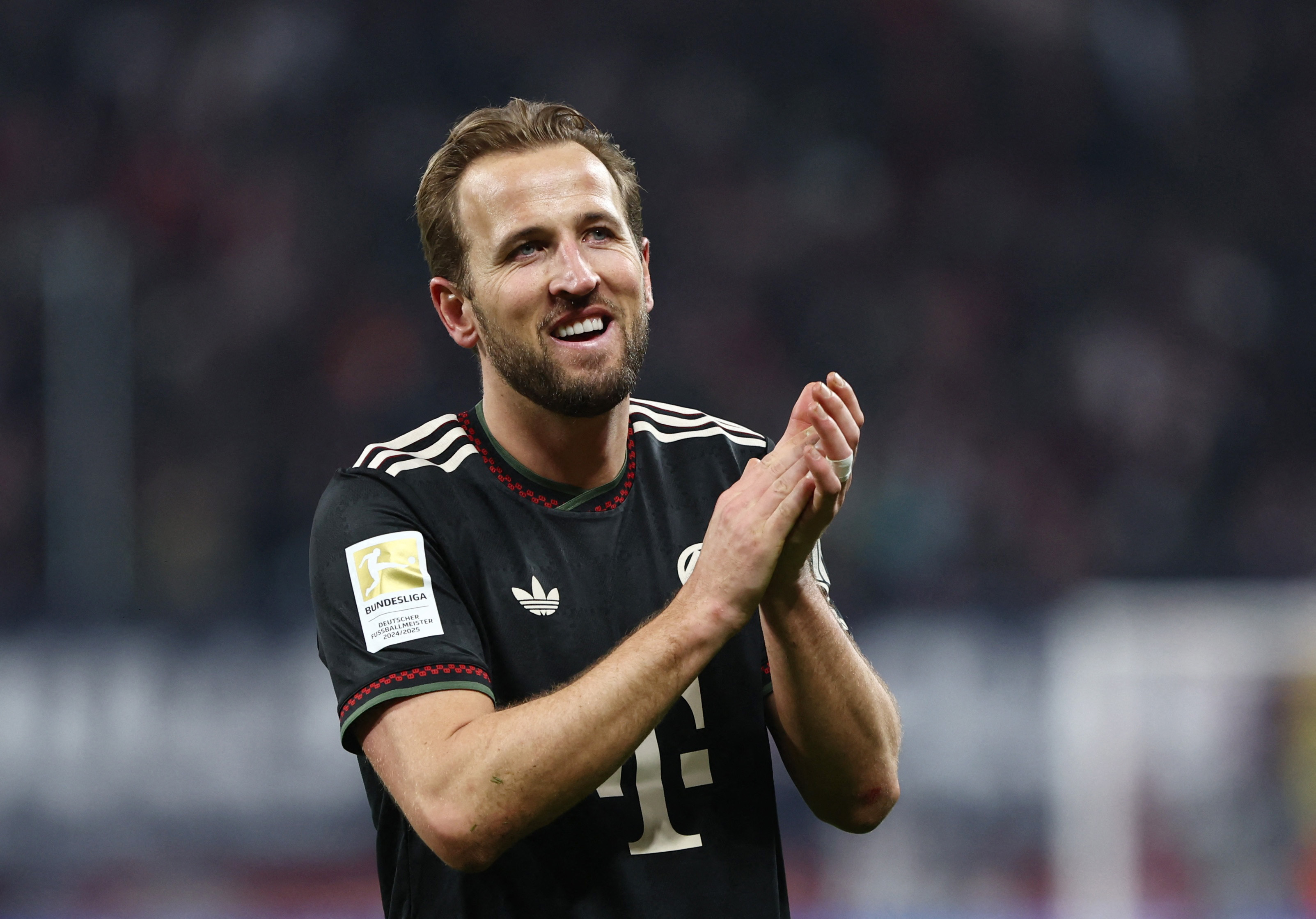 Harry Kane in action as we provide our Champions League predictions. 