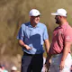 Scottie Scheffler of the United States and Jon Rahm of Spain talk on the 13th hole as we look at the best U.S. Open odds
