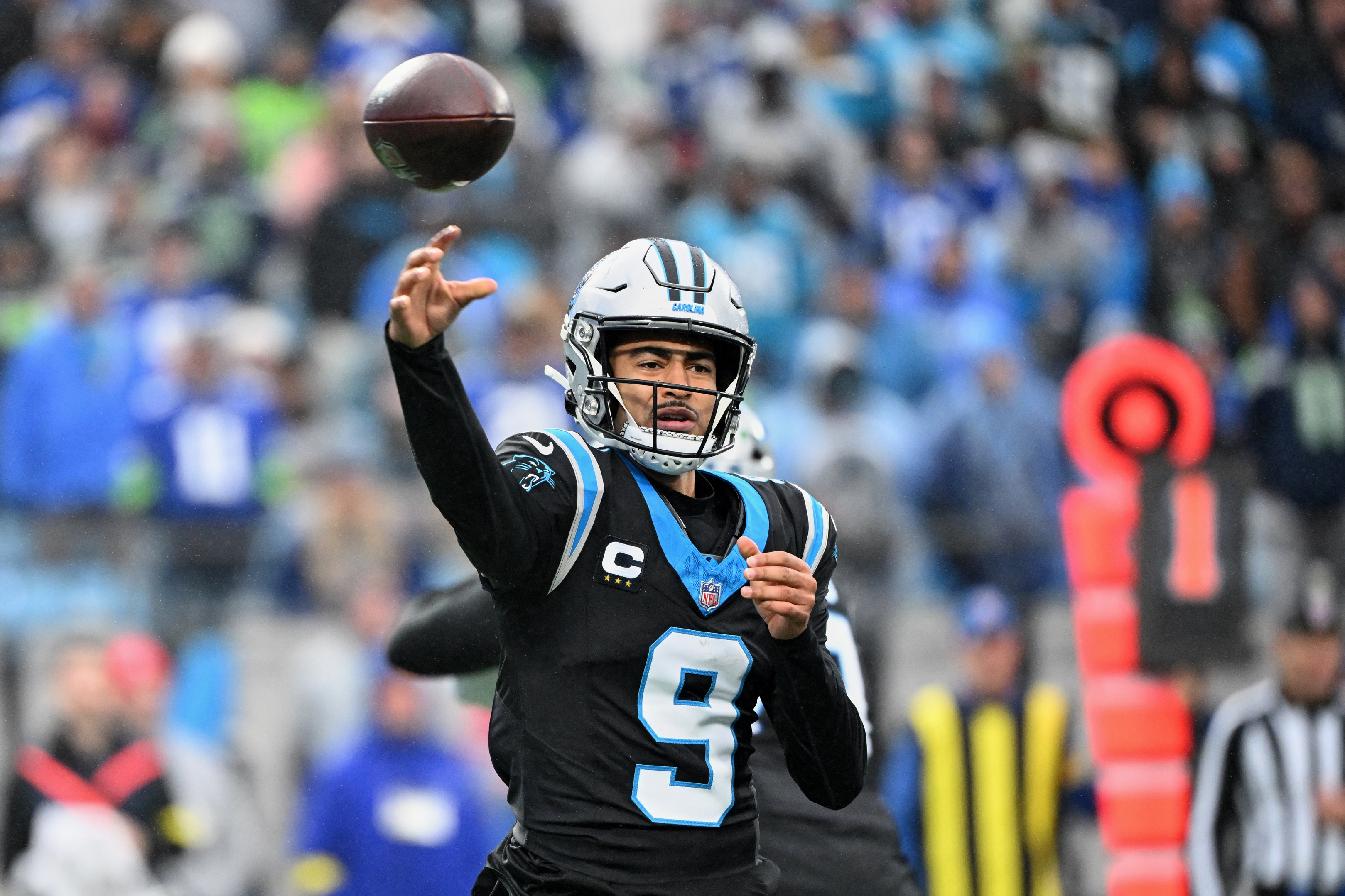 Bryce Young throws a pass as we offer our Panthers vs. Buccaneers predictions and opening odds. 