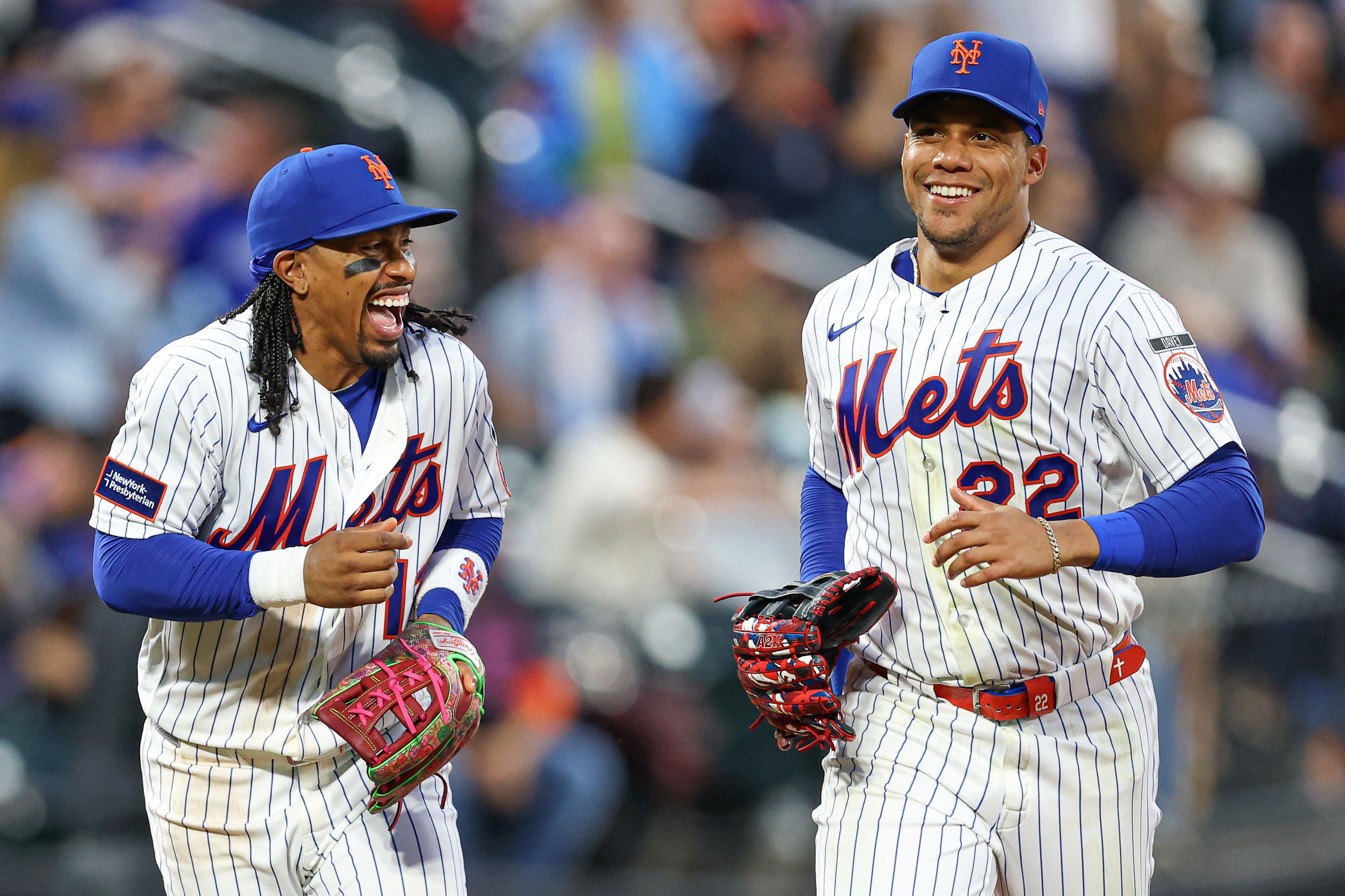 New York Mets left fielder Juan Soto reacts with shortstop Francisco Lindor, and they're both key to the Mets vs. Phillies win probability.