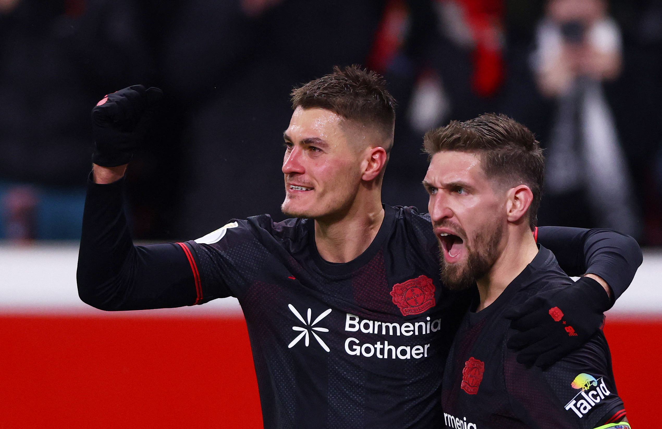 Patrik Schick celebrates scoring with Robert Andrich as we provide our Bayer Leverkusen vs. Olympiacos prediction and odds.