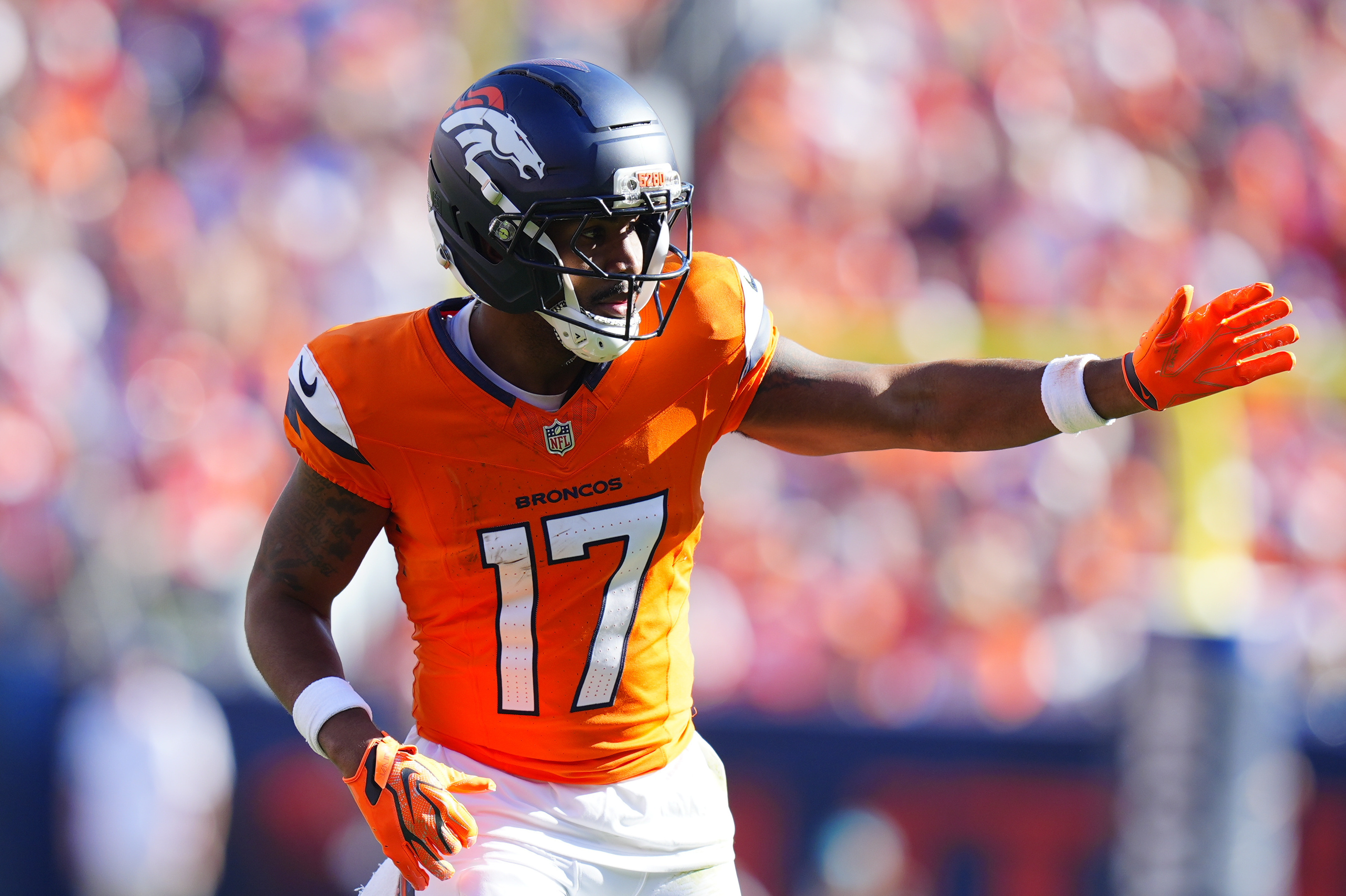 Denver Broncos wide receiver Jaylen Waddle (17) signals before a play as we provide our Broncos vs. Chargers prediction.