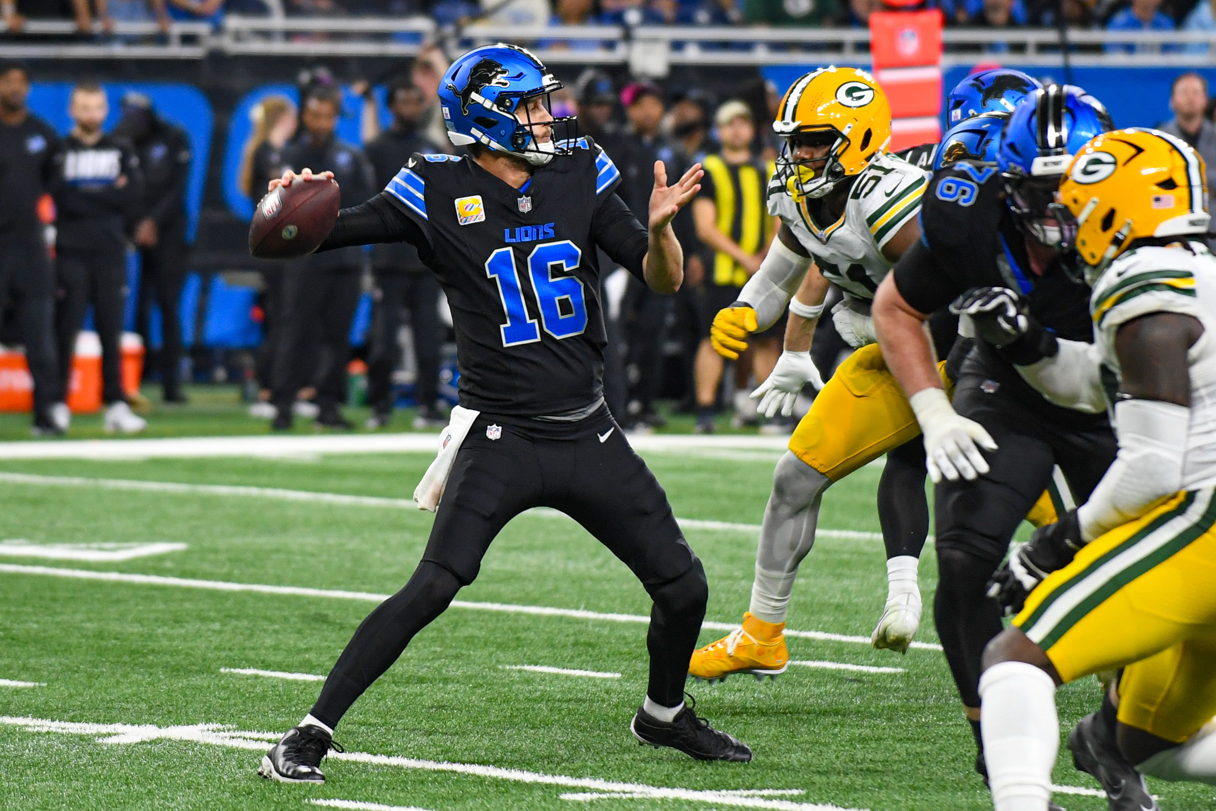 Pictured: Lions quarterback Jared Goff throwing a pass as we break down our NFL Best Bets for Week 8: ATS Picks & Player Props This Week. Photo by Aaron J. Thornton/Sipa USA.