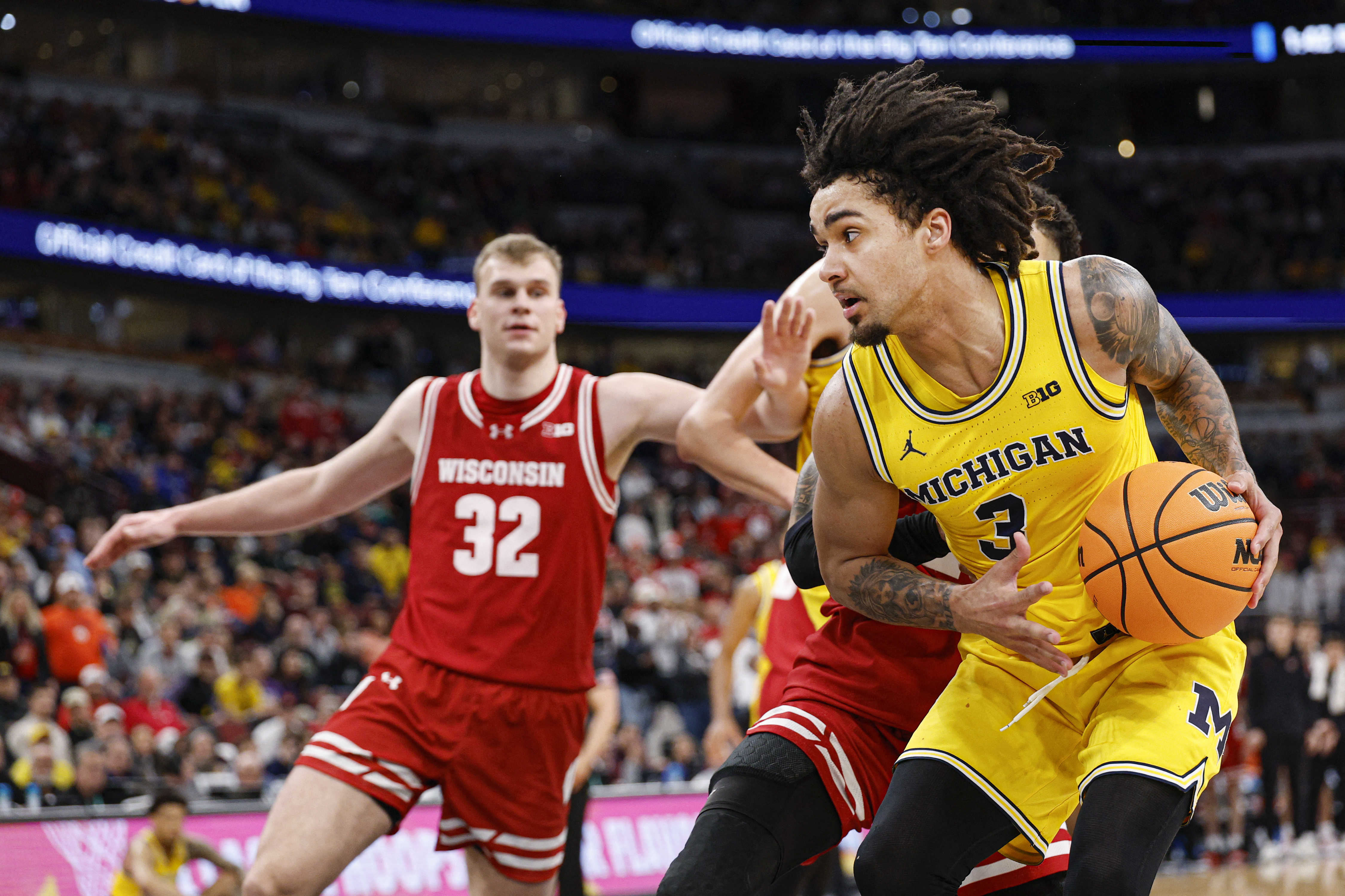 Michigan Wolverines guard Elliot Cadeau (3), featured in our Alabama vs. Michigan player props, drives to the basket.