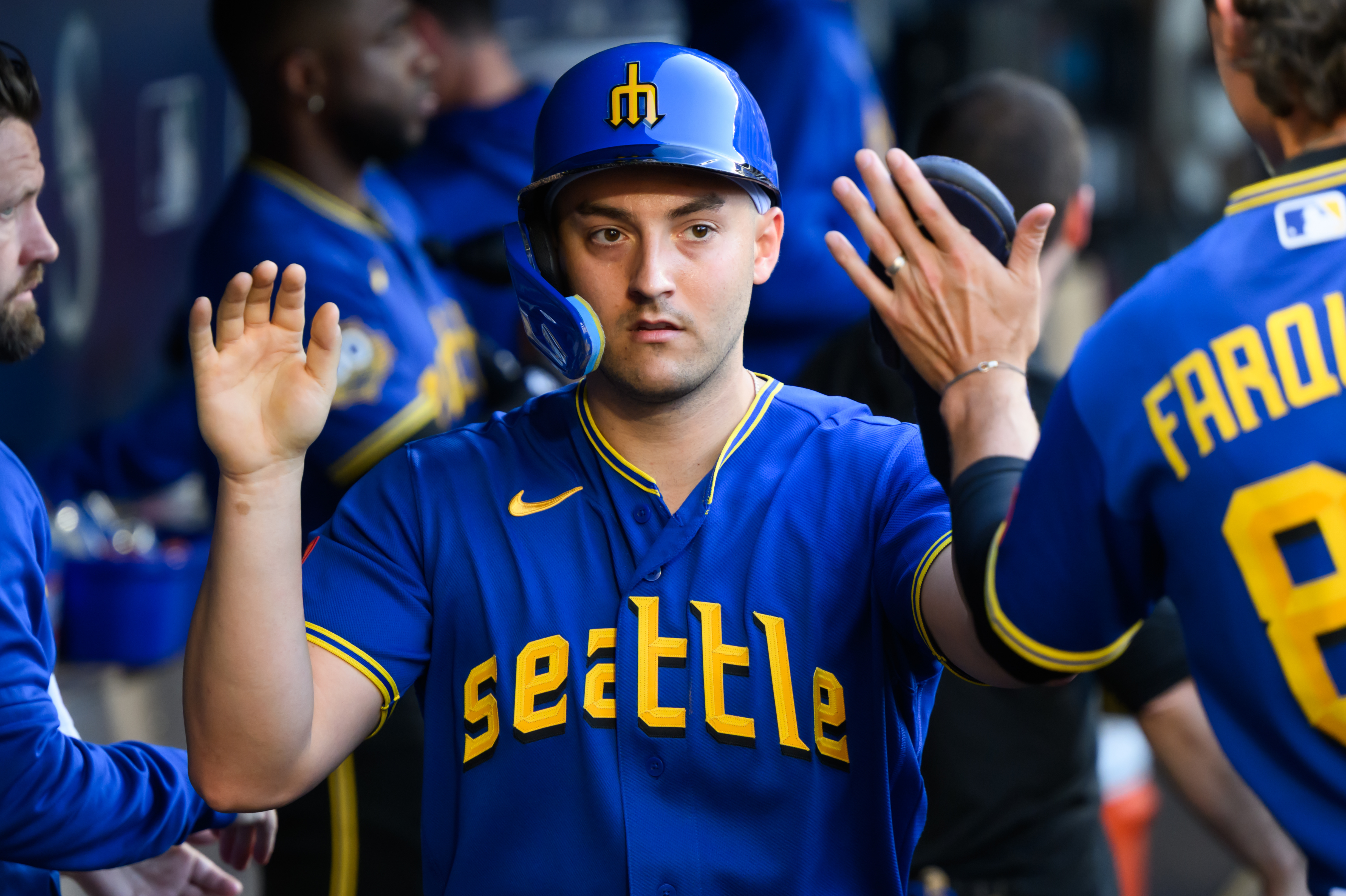 Seattle Mariners designated hitter Dominic Canzone (8) celebrates as we break down our home run predictions today.