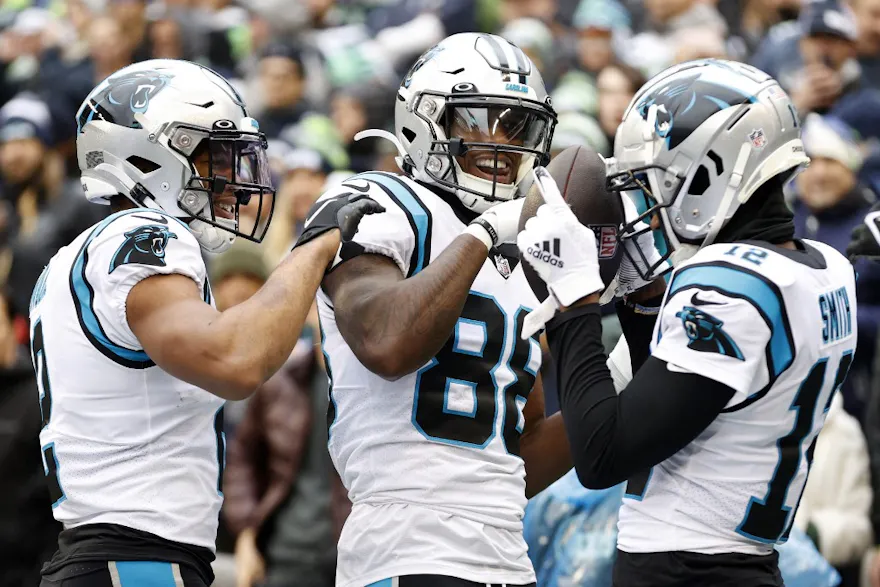 Shi Smith celebrates his touchdown with Terrace Marshall Jr. and DJ Moore of the Carolina Panthers in the first quarter of the game against the Seattle Seahawks at Lumen Field in Seattle, Washington. Photo by Steph Chambers Getty Images via AFP.