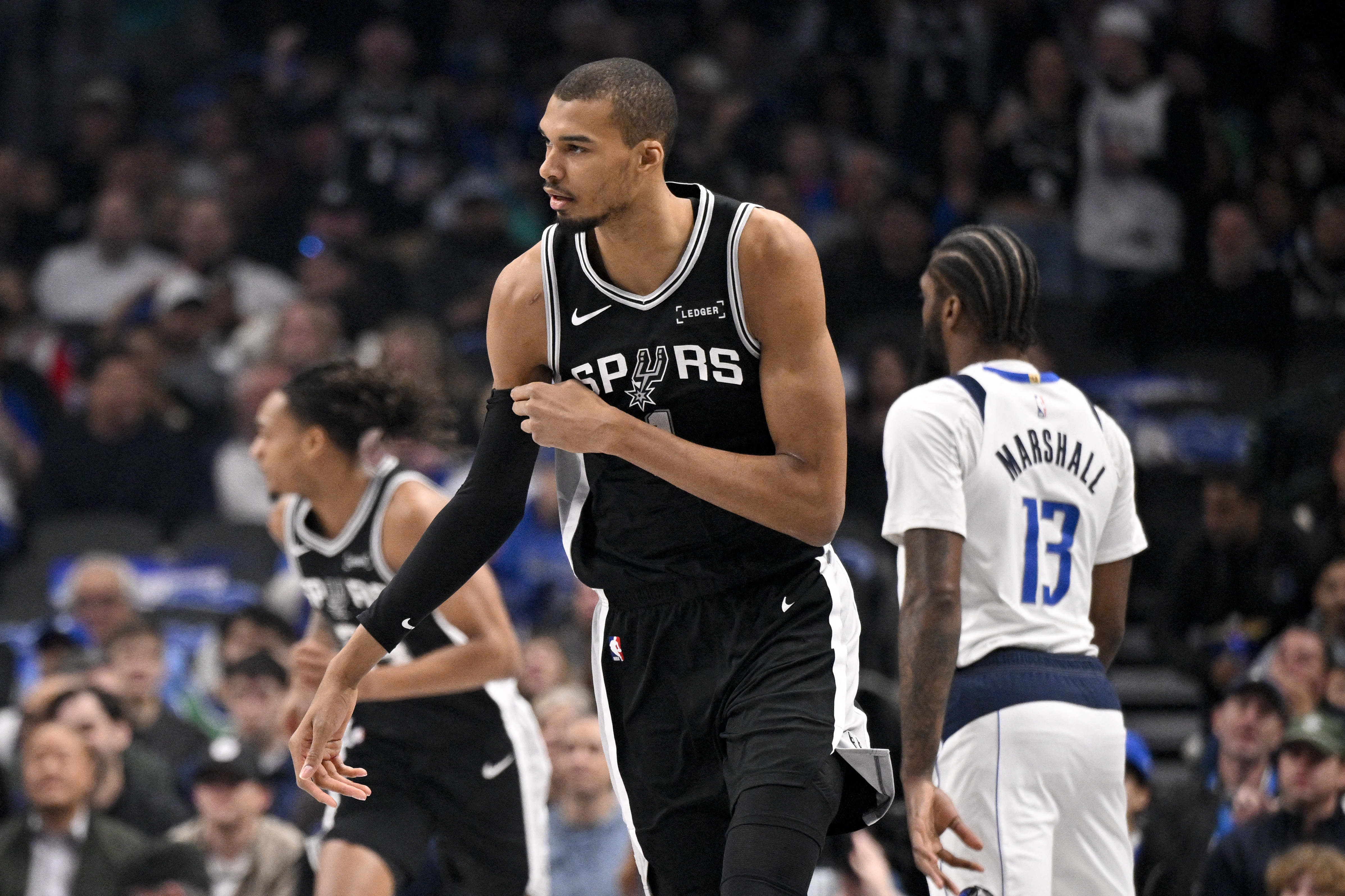 San Antonio Spurs forward Victor Wembanyama (1), seen here celebrating a made 3-pointer, is featured in our Spurs vs. Lakers player props today.