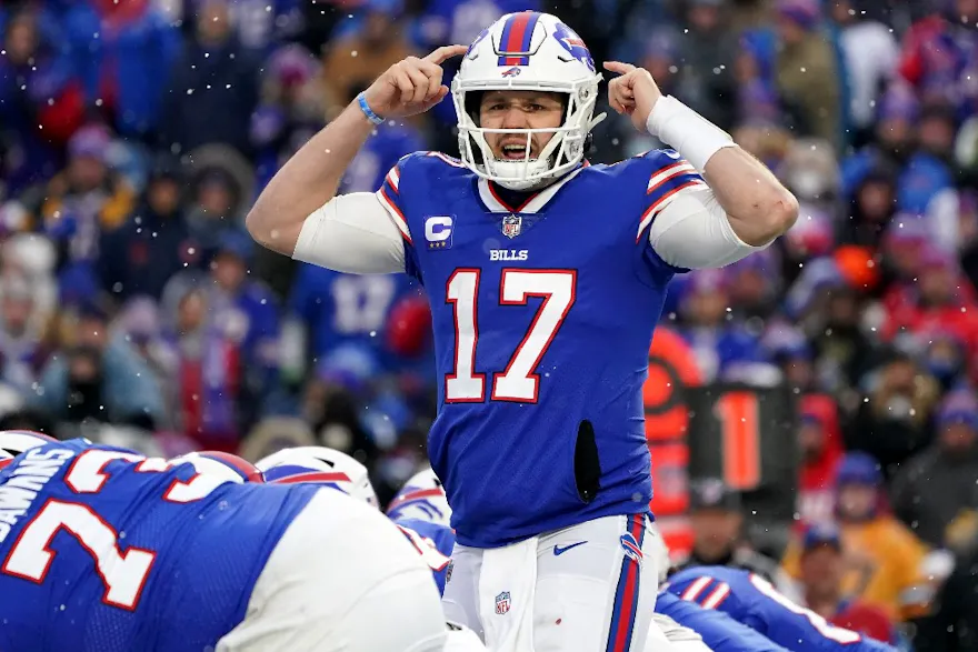 Josh Allen of the Buffalo Bills signals at the line of scrimmage during the game against the Atlanta Falcons, and we offer our top Josh Allen NFL player props for Bills vs. Buccaneers based on the top NFL odds.
