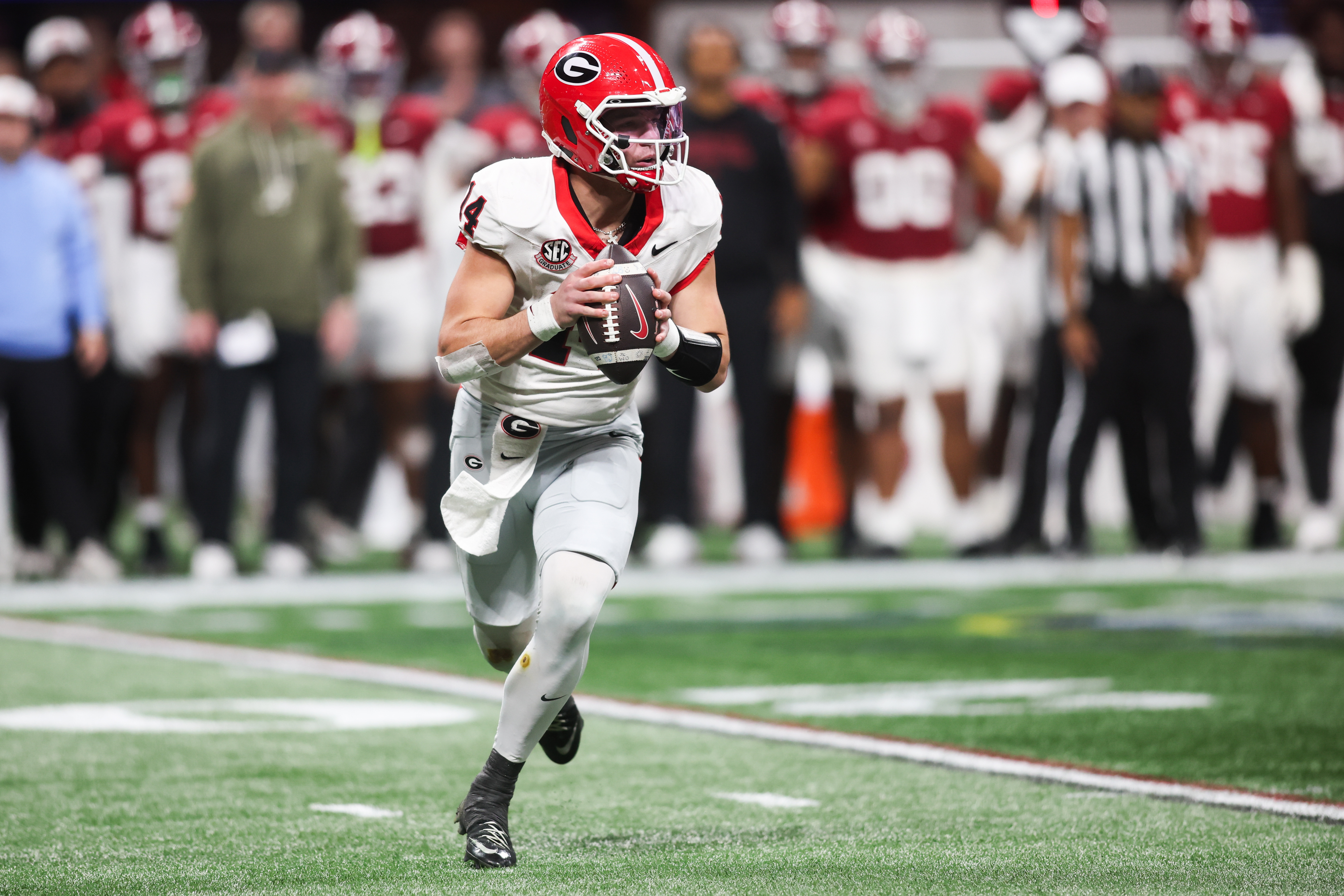Georgia Bulldogs quarterback Gunner Stockton (14) looks to pass as we break down our Ole Miss vs. Georgia expert picks for the Sugar Bowl.