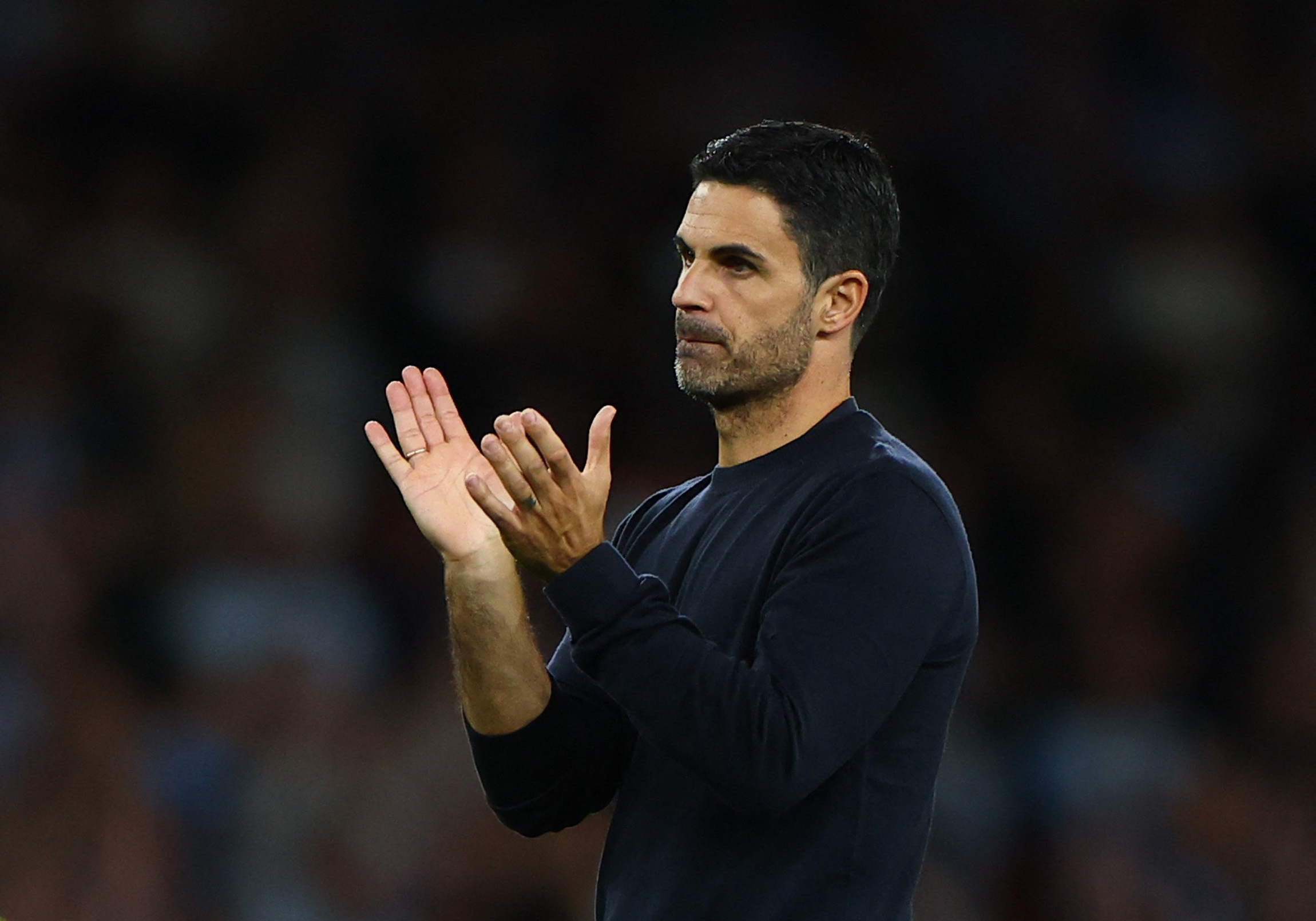 Arsenal manager Mikel Arteta applauds fans as we break down our Aston Villa vs. Arsenal prediction.