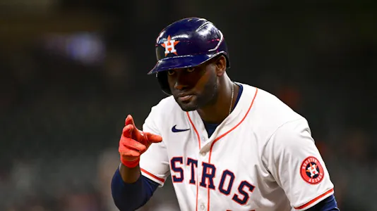 Yordan Alvarez of the Houston Astros gestures to the Toronto Blue Jays' dugout in the first inning, and we're offering our top MLB player props and expert picks based on the best MLB odds.