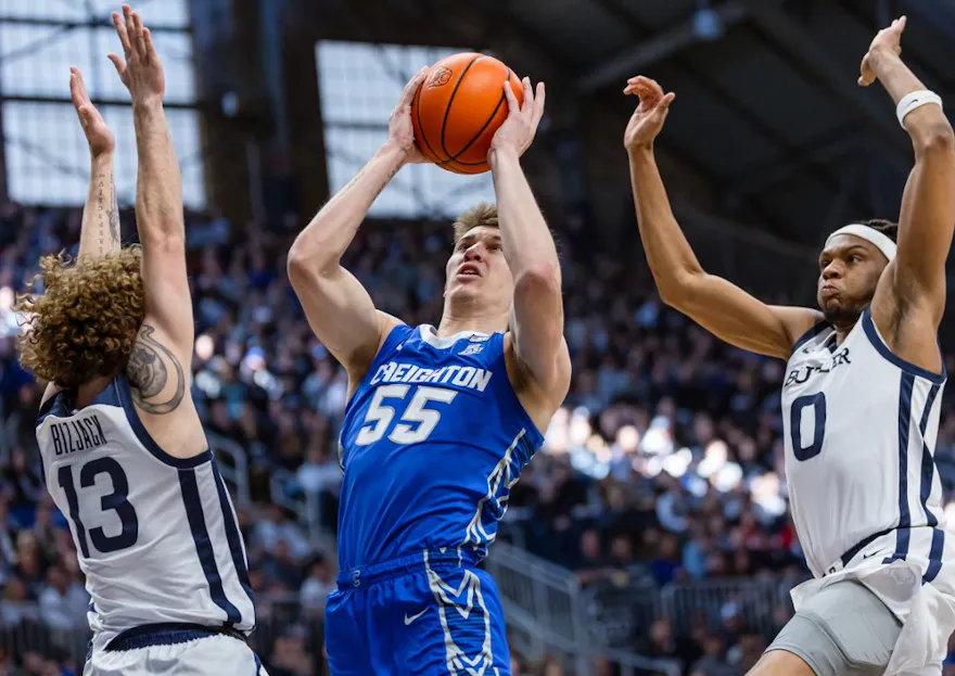 Baylor Scheierman #55 of the Creighton Bluejays shoots the ball as we look at our college basketball player props and best bets for Saturday.