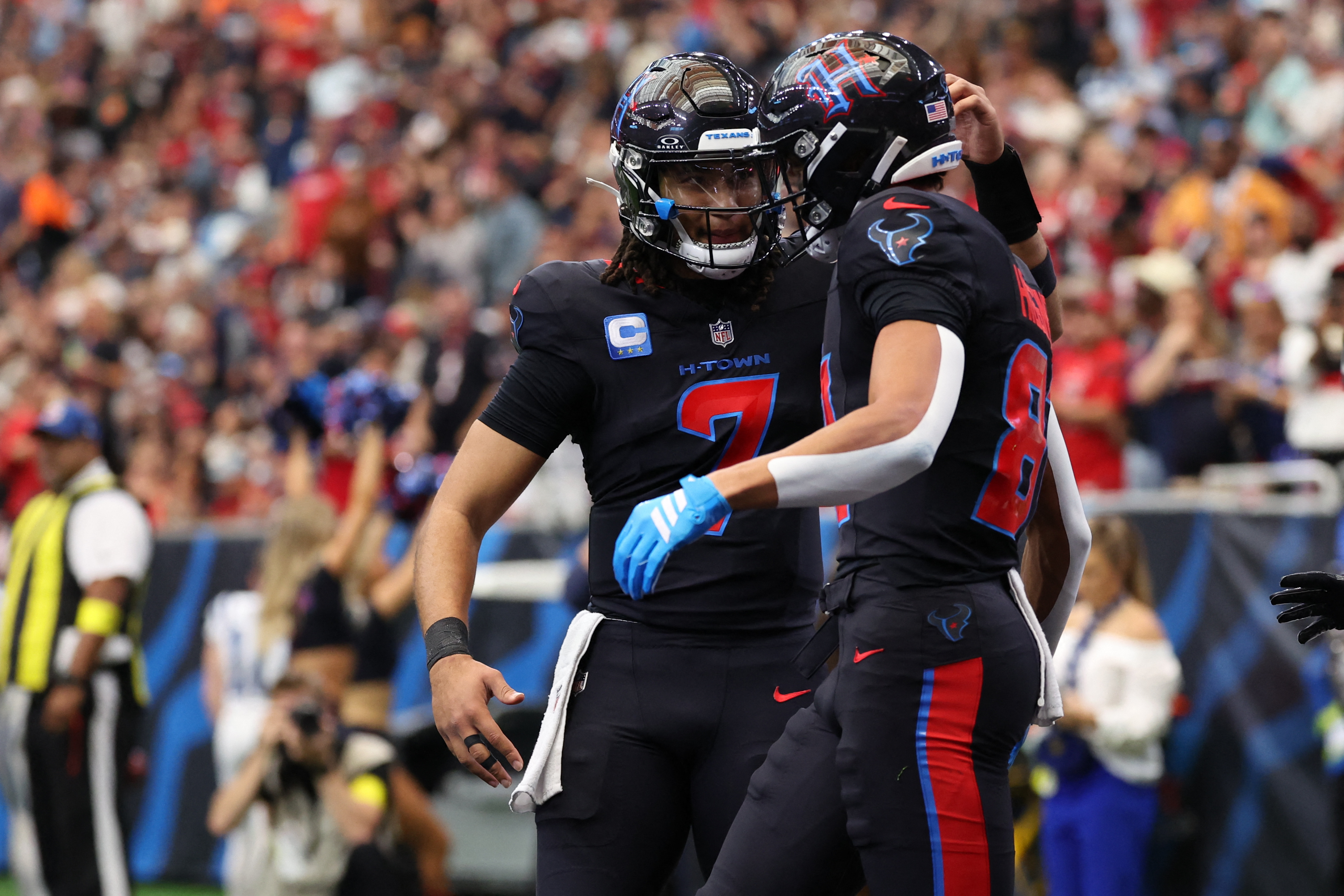 Jayden Higgins reacts with quarterback C.J. Stroud after making a touchdown catch as we offer our Texans vs. Steelers prediction.