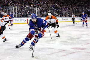 Mika Zibanejad of the New York Rangers carries the puck as we make our best Hurricanes vs. Rangers predictions