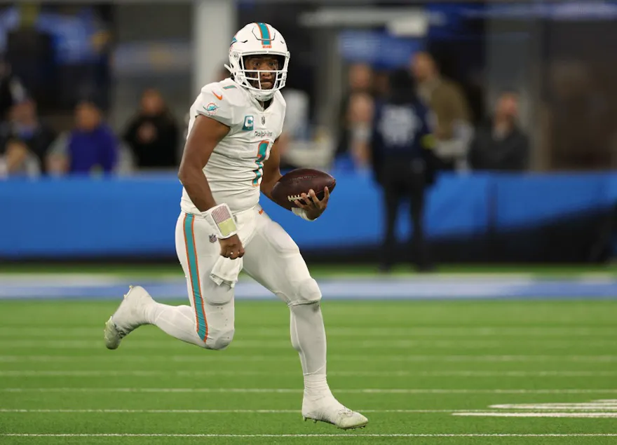 Tua Tagovailoa of the Miami Dolphins scrambles as we share our best player props for the quarterback against the New York Jets.
